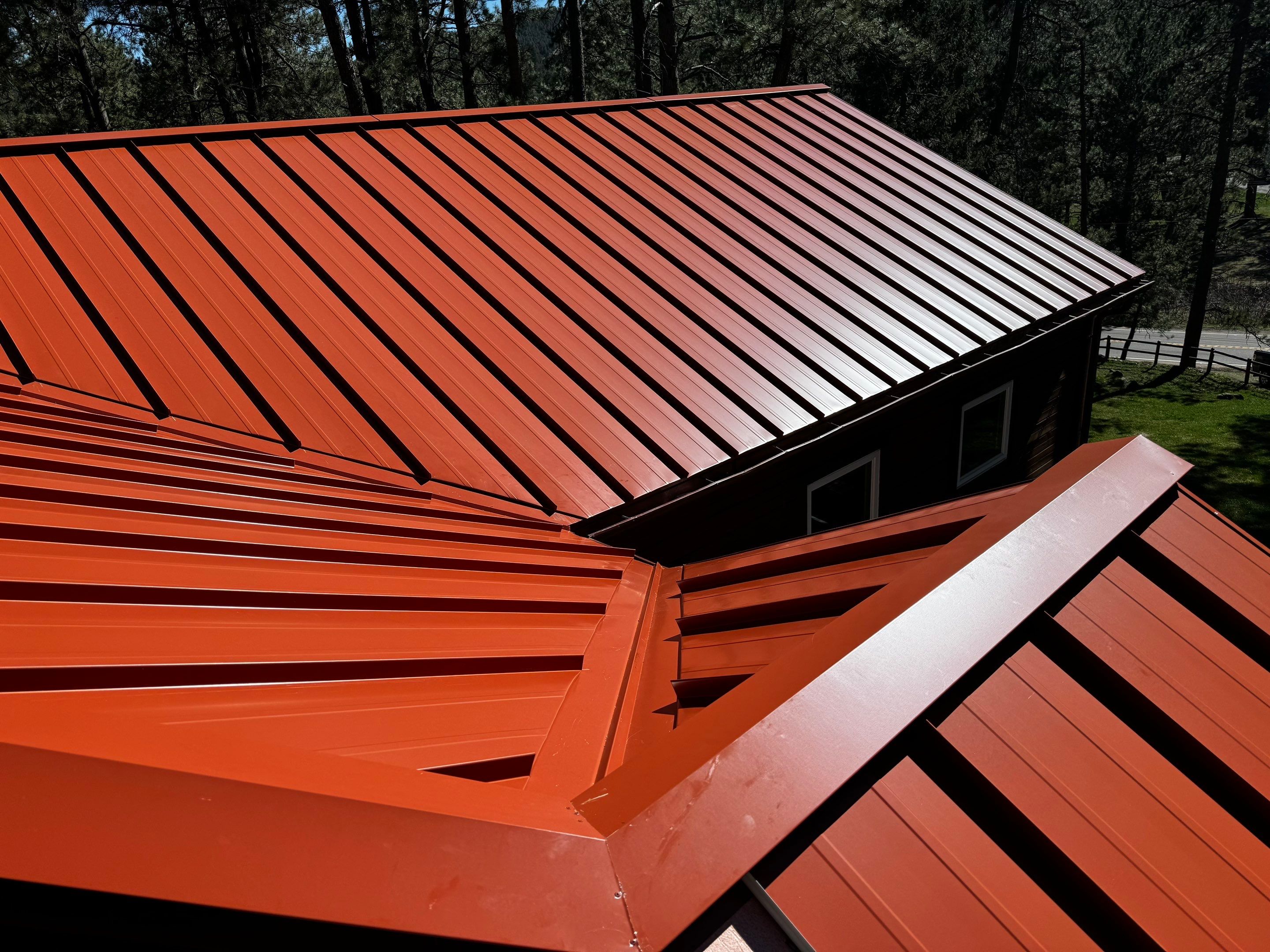 Residential Roofing Installation using Standing Seam Metal by Blue Peaks Roofing LLC 