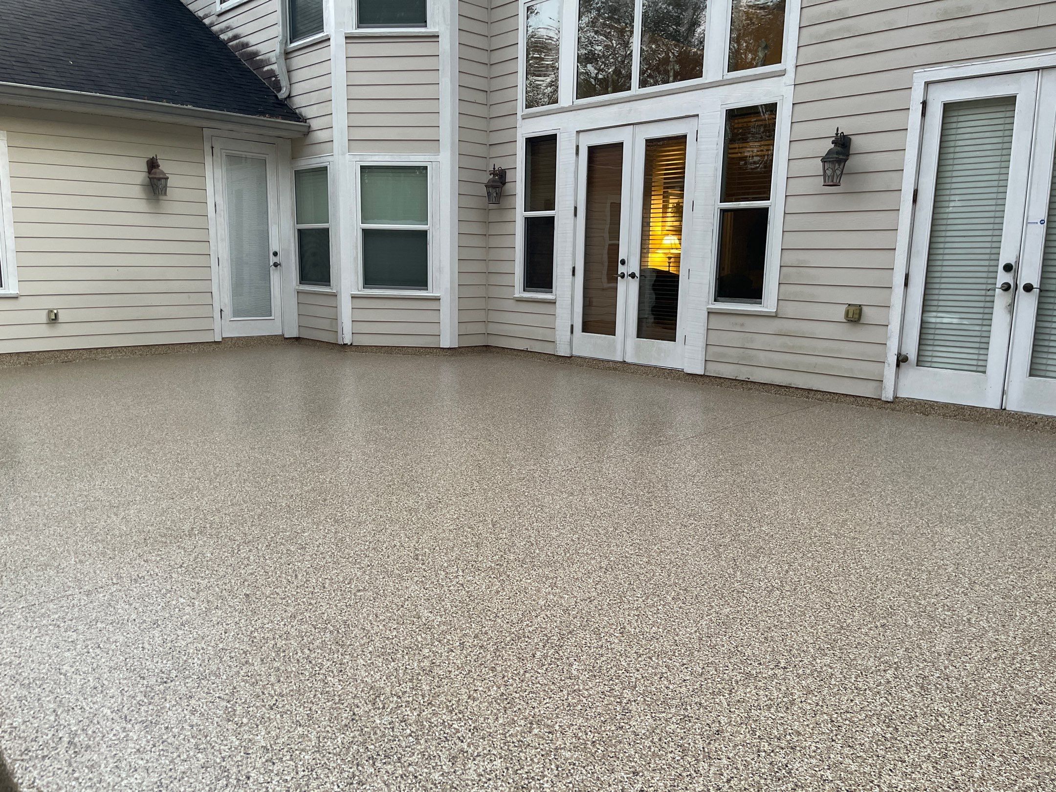 Patio  in Gainesville, FL in Sandstone by Cross Creek Concrete Coatings
