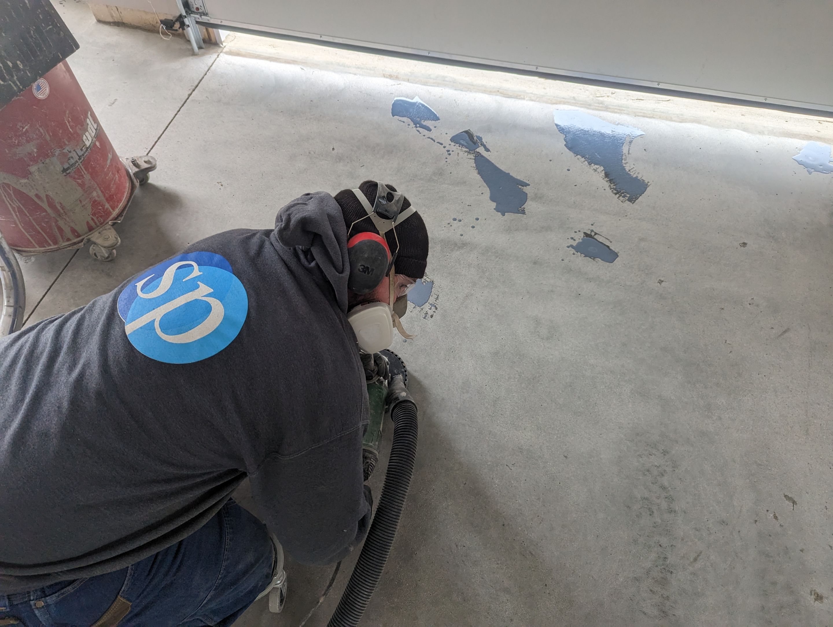 Garage using Mediterranean by Select Painting, Coatings & Garage Cabinets