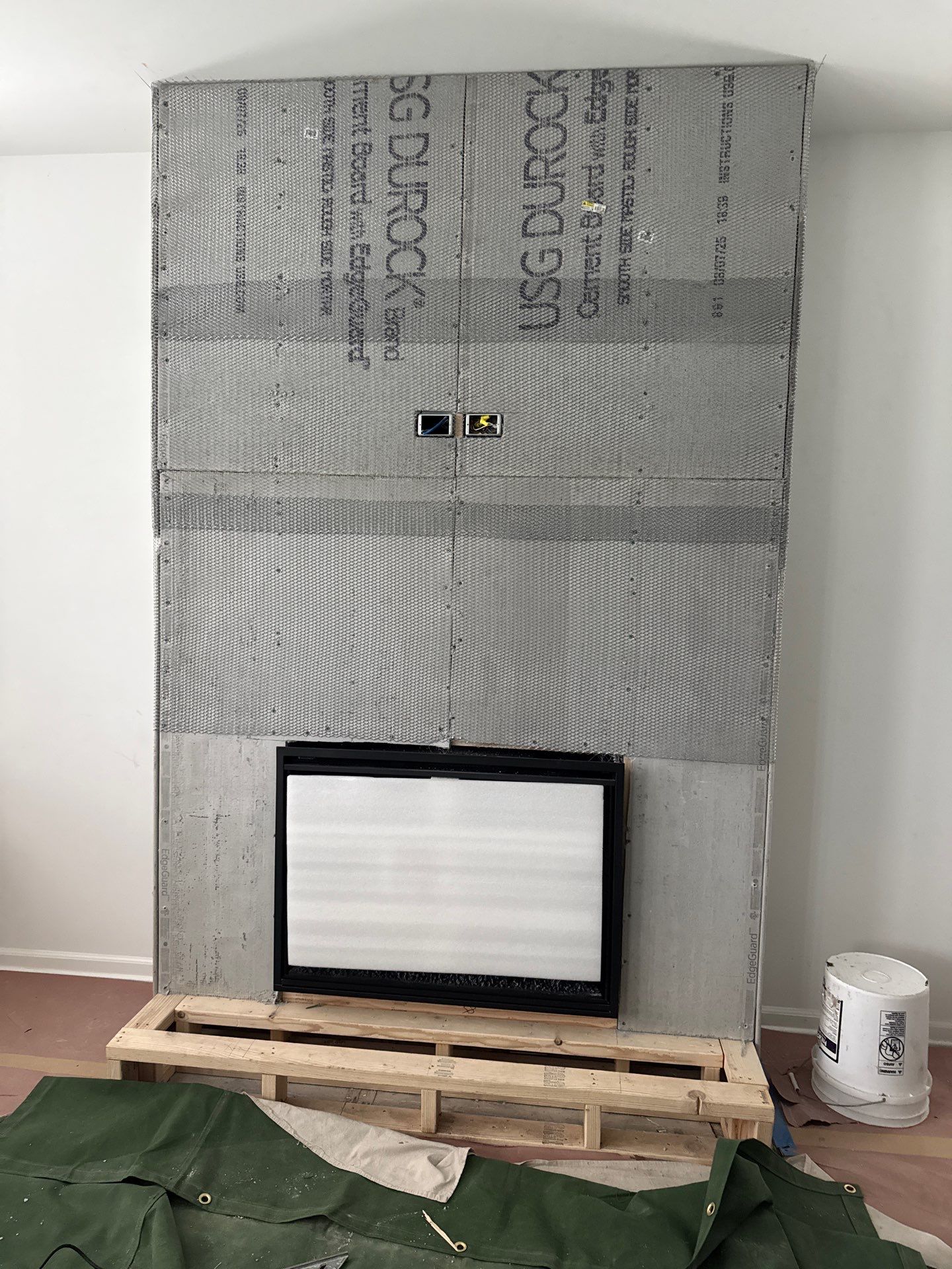 Electric Fireplace & Stone Veneer Installation by Leonard and Sons Building Services, Inc.