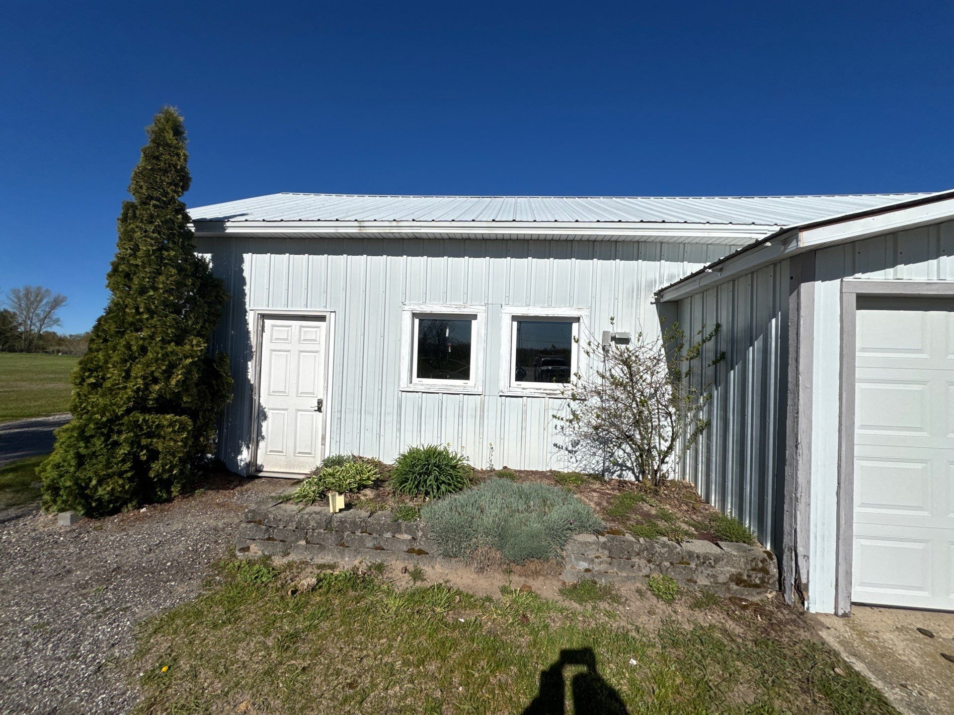 Exterior Painting and Trim Restoration for Mears Metal Buildings by Gordon Painting