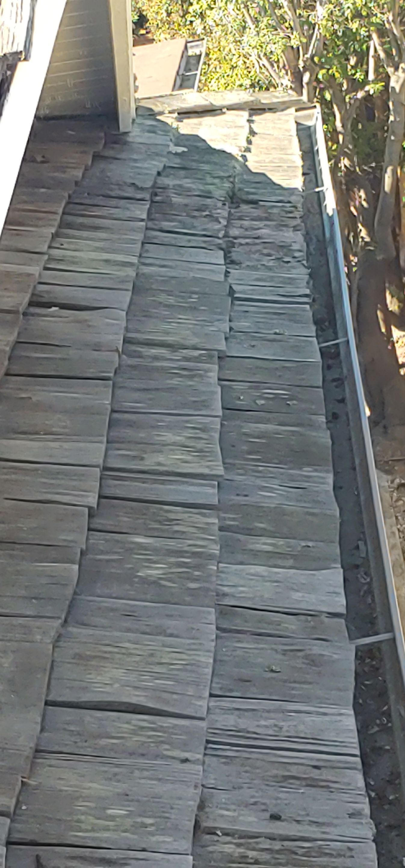 Refurbish and repair shake roof to get ready to sell by Straight Edge Roofing Inc