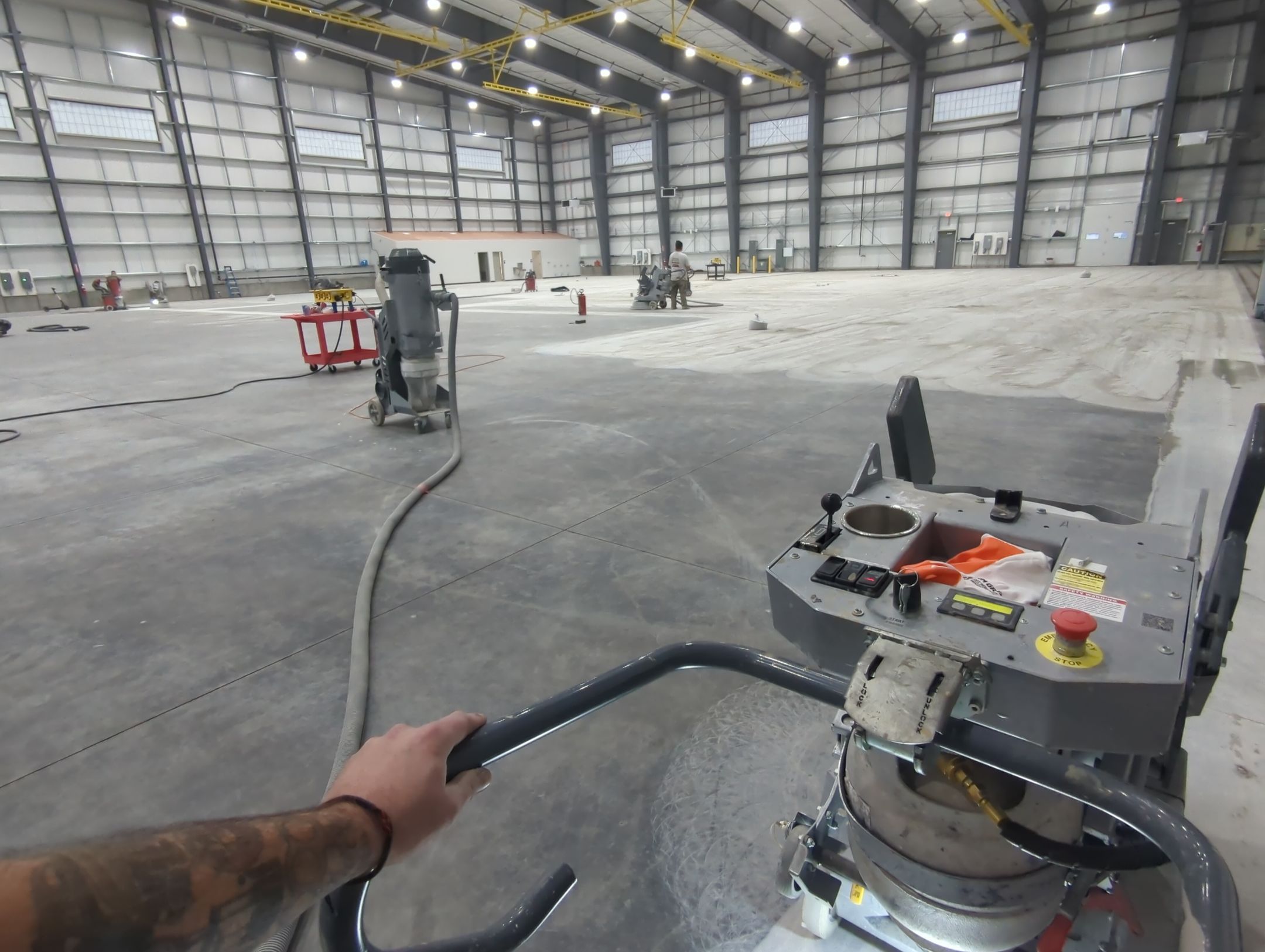 Airplane Hanger using Light Grey Commercial Penntek Epoxy by Croc Coatings, LLC