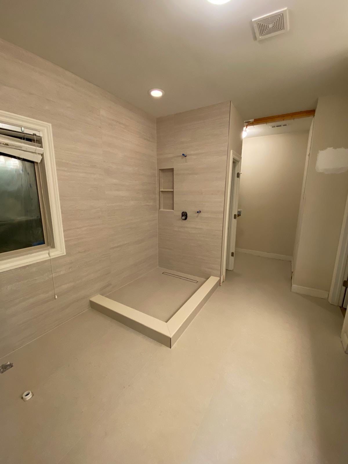 Master bathroom renovation using Free standing tub by Prudencio