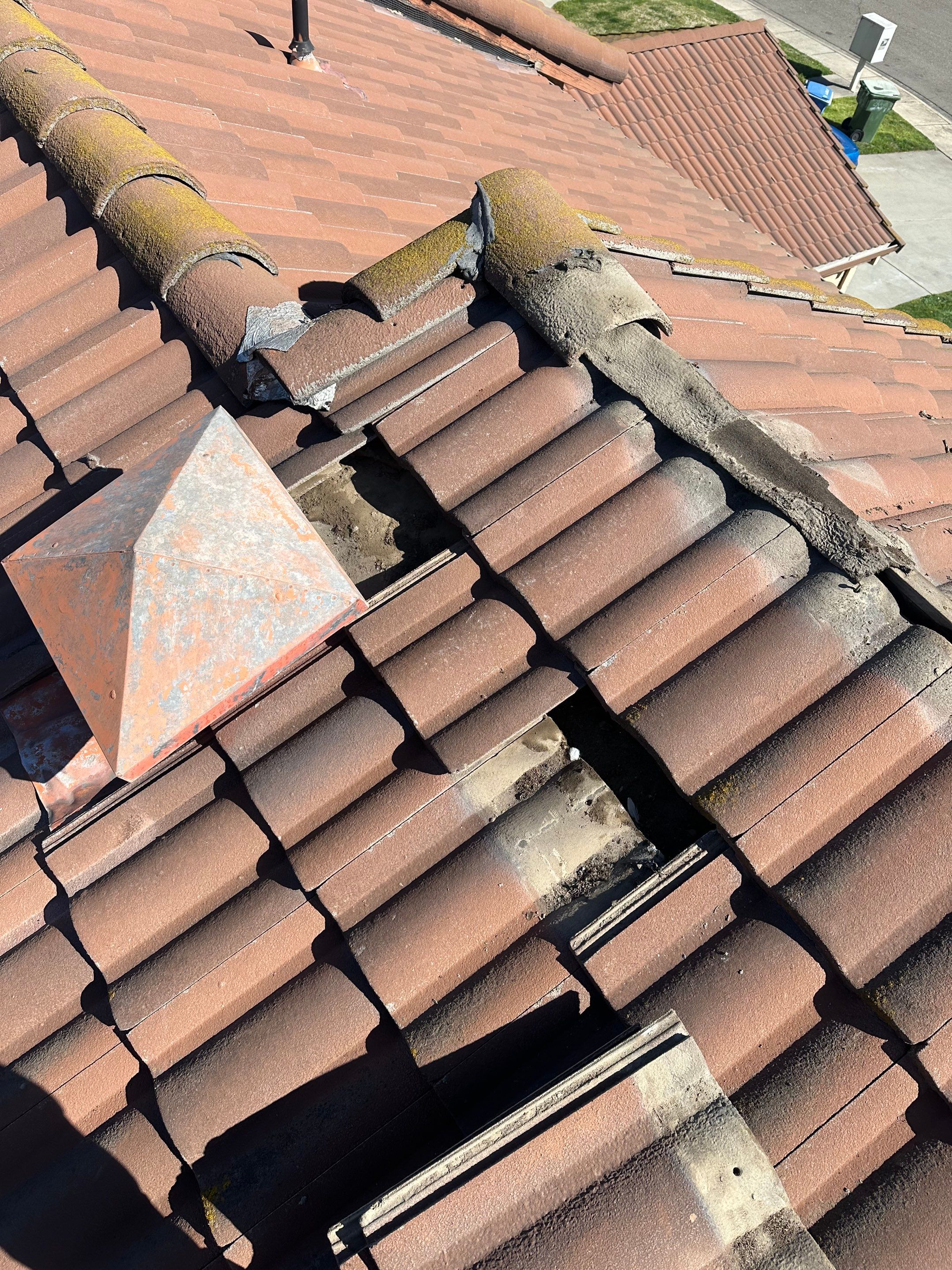 Tile Roof repair by Grandmark Service Company
