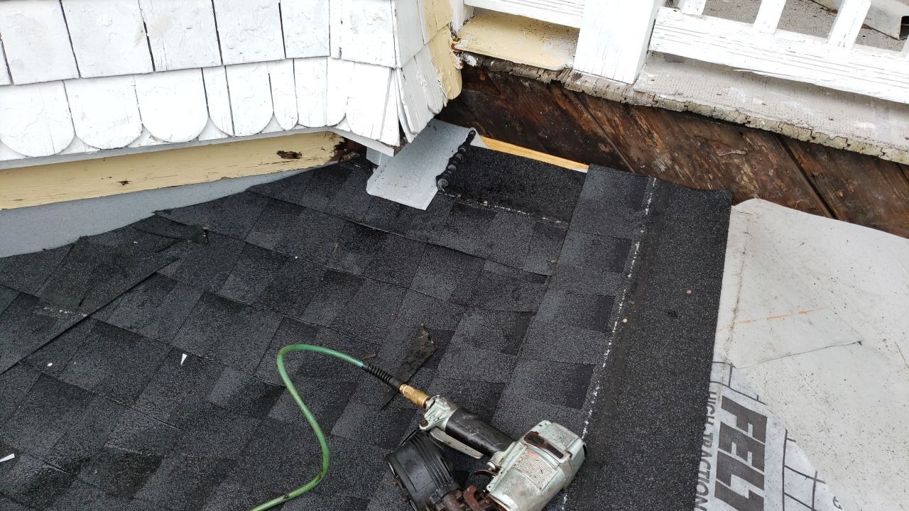 Residential Roofing Installation using Roof Replacement by American Roofing & Construction LLC