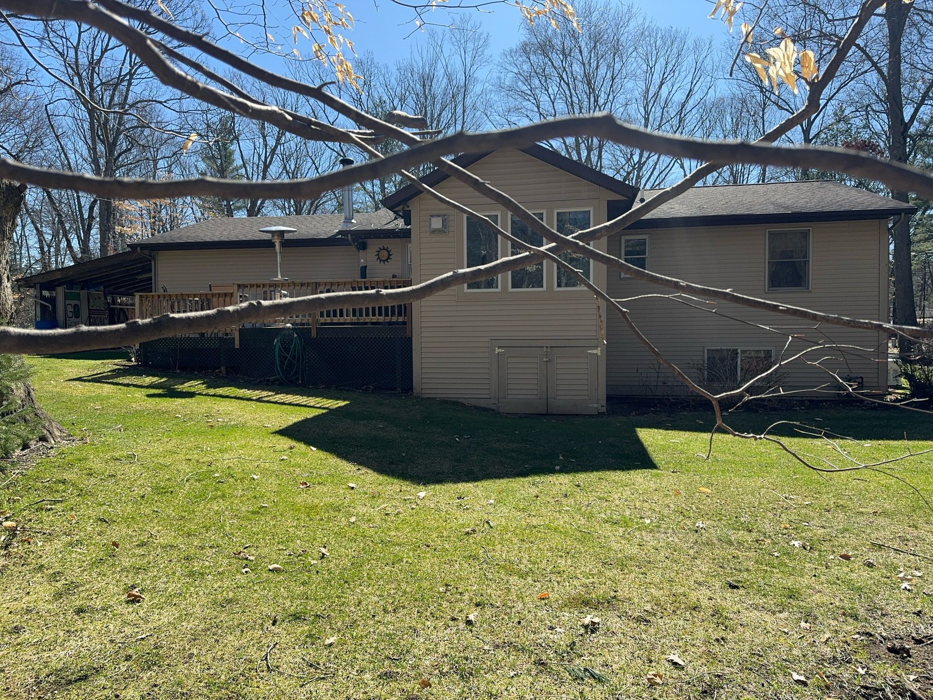 Siding, Deck and Versetta Stone by Avalon Roofing and Exteriors
