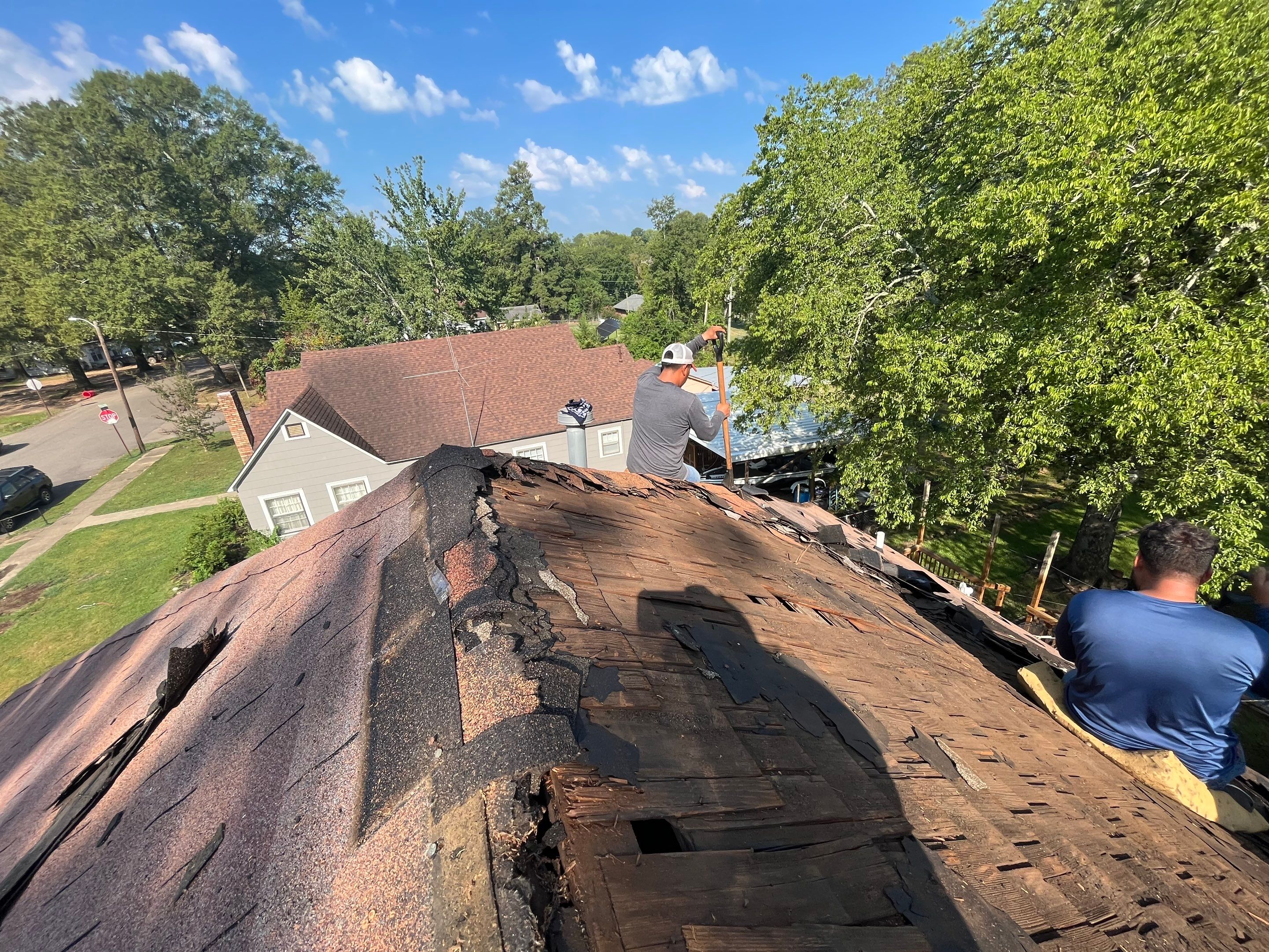 Residential Metal Roof Replacement using Reed's Metals: Colored Residental Panel (Burgundy) by Hostetler Roofing