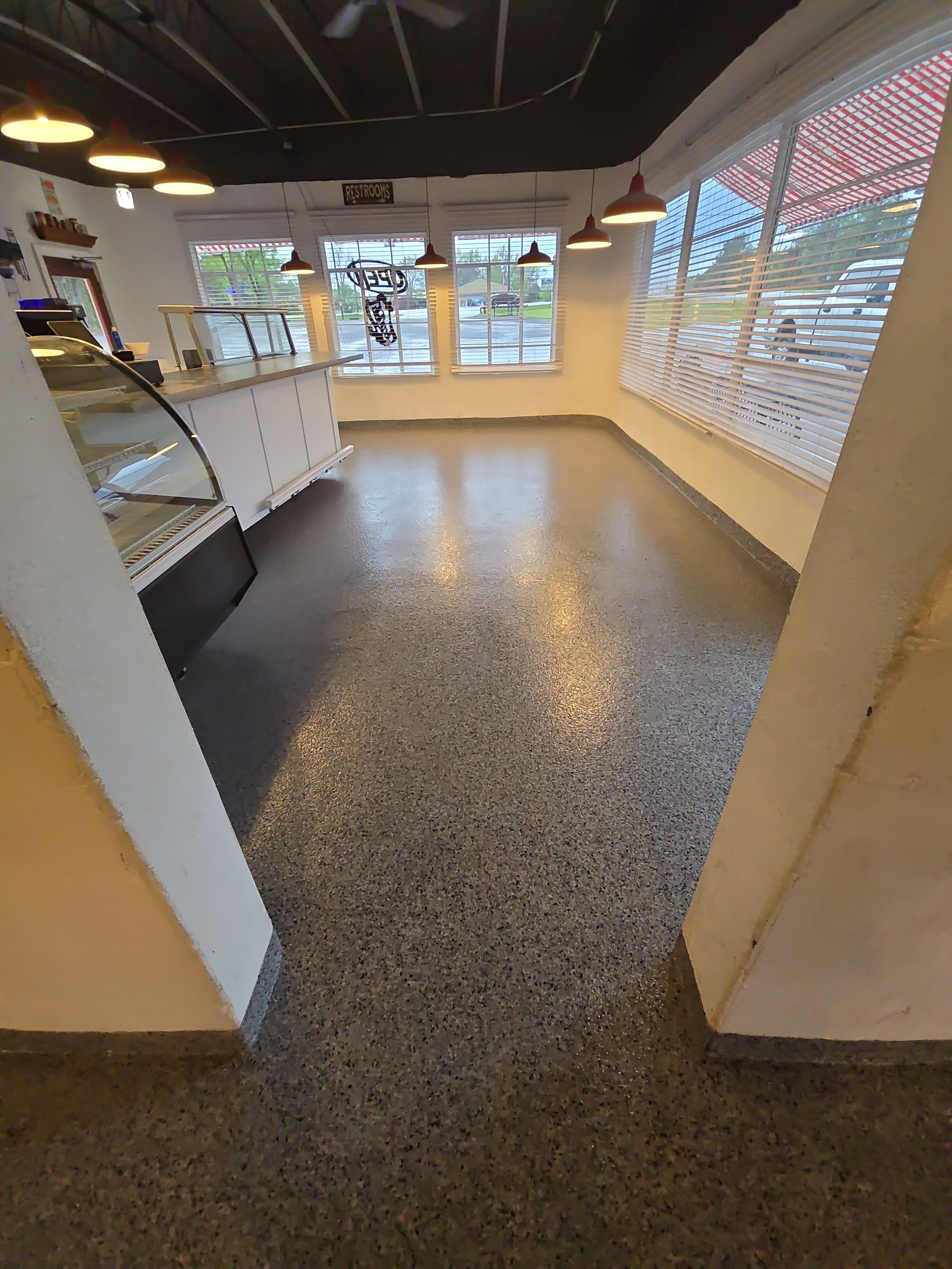 Check it out! Steelwheel Corner gets a new floor! by Elite Floor Solutions