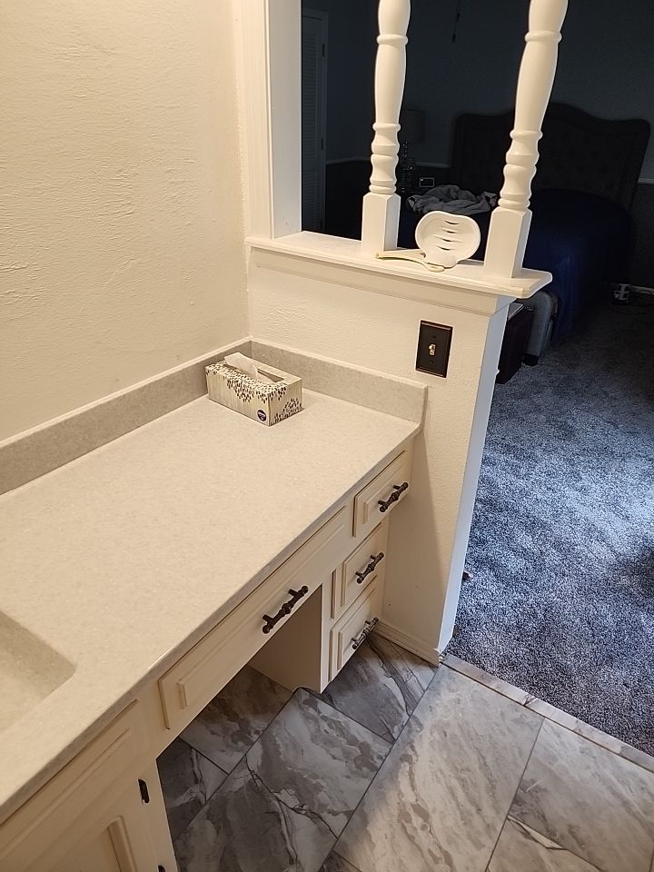 New shower, flooring, and countertop by The Shower Company