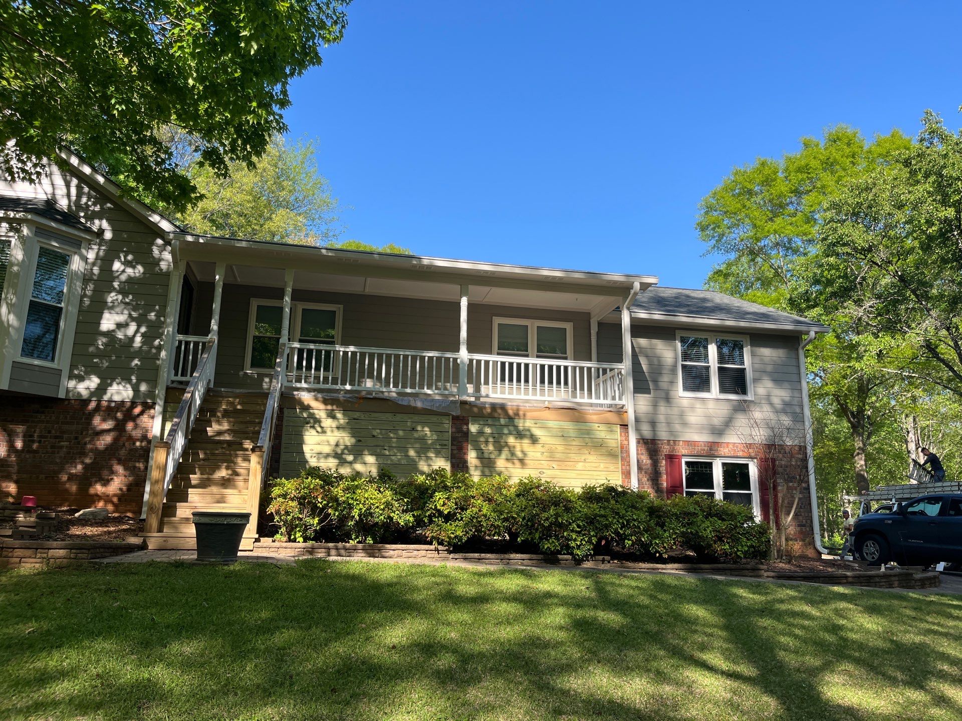 Window, Siding, & Rotten Wood Replacement with Exterior Painting in Woodstock, GA by Nelson Exteriors 