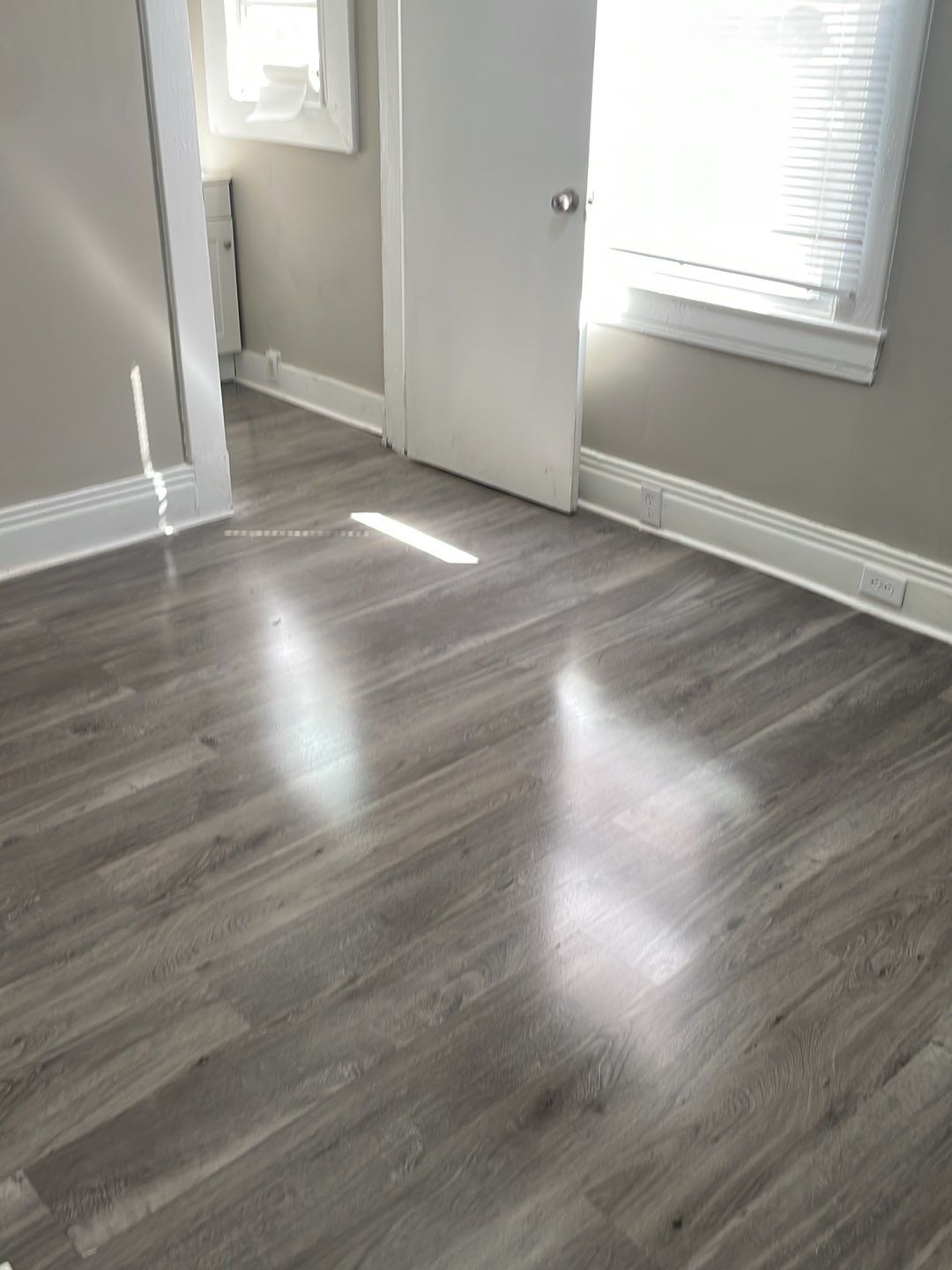 Rental Property Restoration, siding, flooring, gutters, landscaping by Storm Contracting 