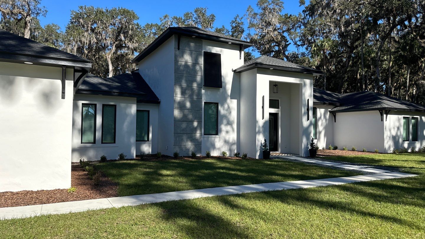 Bahama Shutters in Signal Black  by Smart Guard Shutters