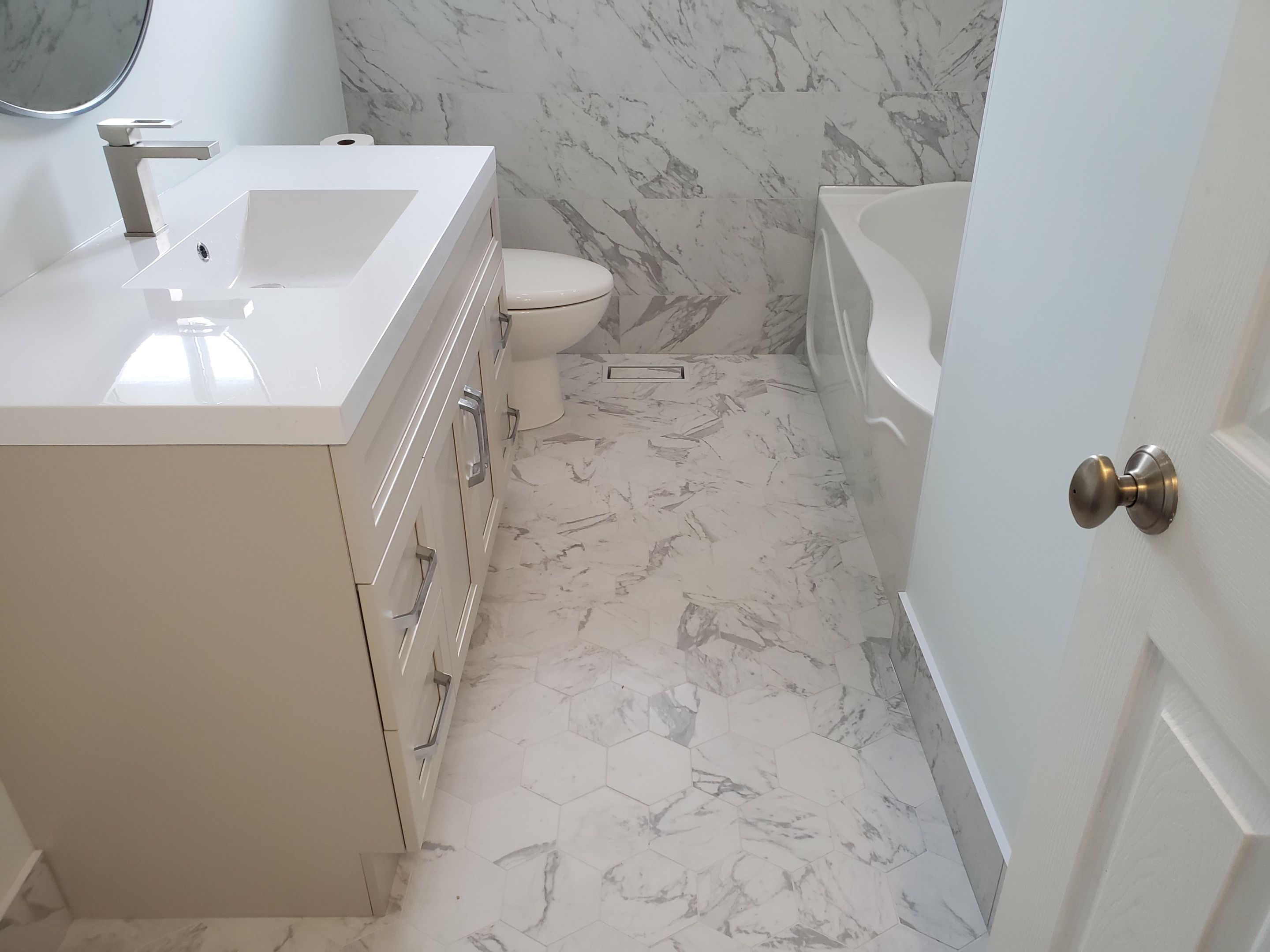 Bathroom Renovation by Impact Construction Sudbury