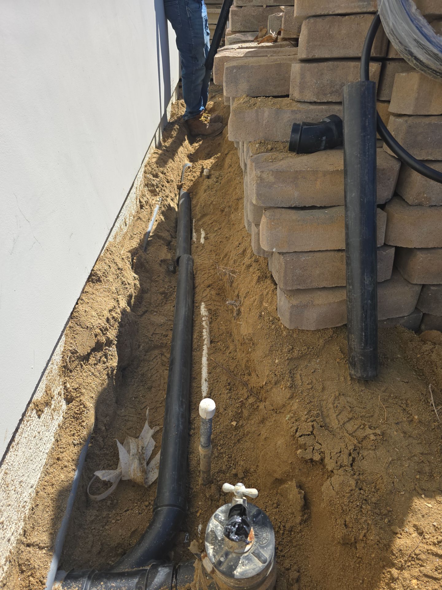 Installing Exterior Water House Line Piping by Us Plumbing