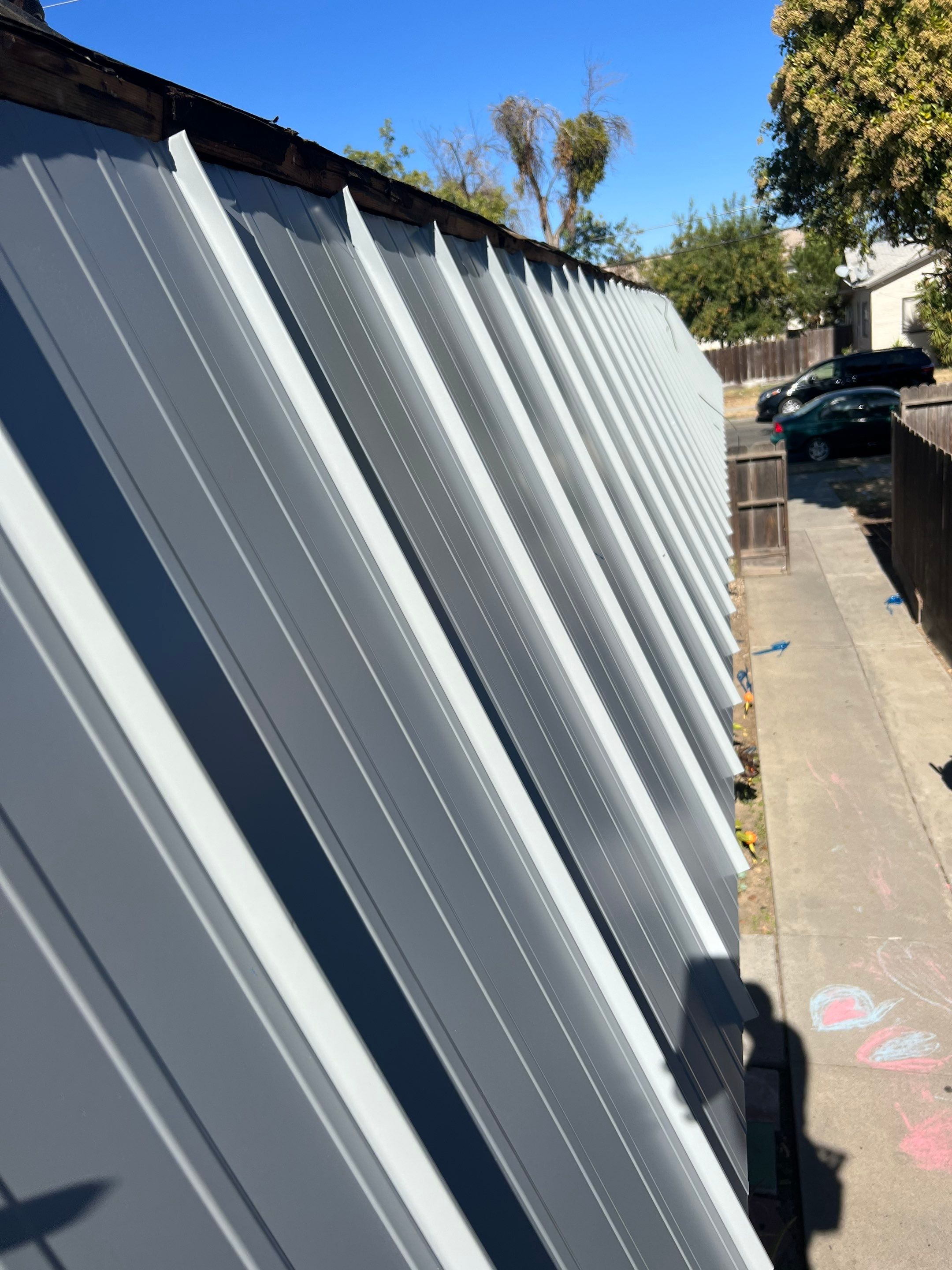 Foam Refurbish using Conklin Benchmark/PUMA XL coatings and spray foam; Also metal roofing around parapet wall by Straight Edge Roofing Inc