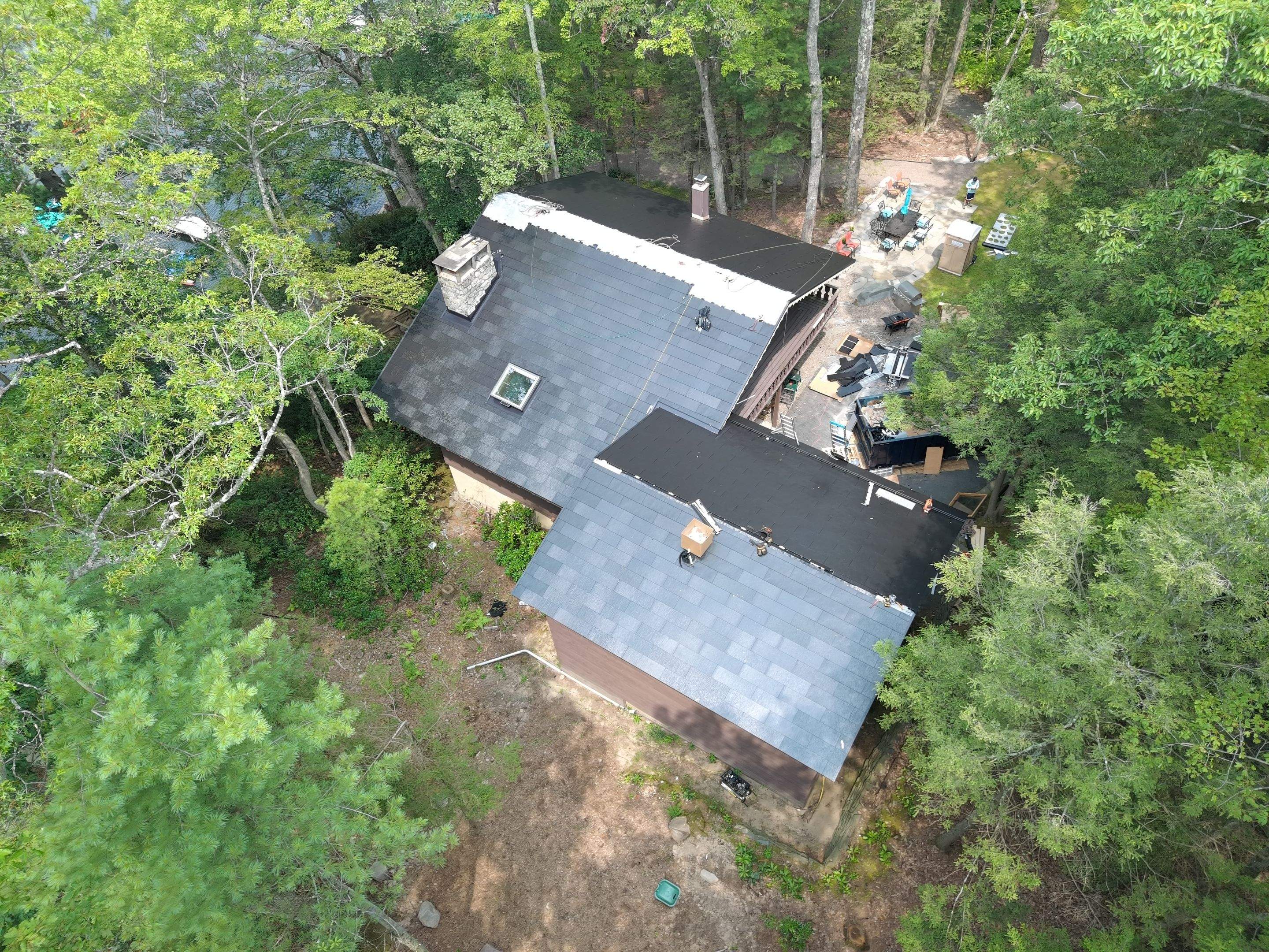Stunning Tesla Solar Roof Cabin in the Woods by American Home Contractors