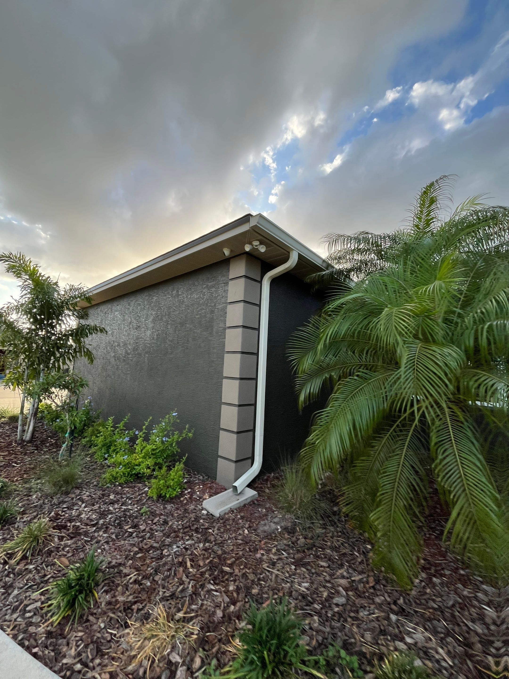  7-inch White seamless gutters and downspouts in Myakka City FL by Gutter Professors