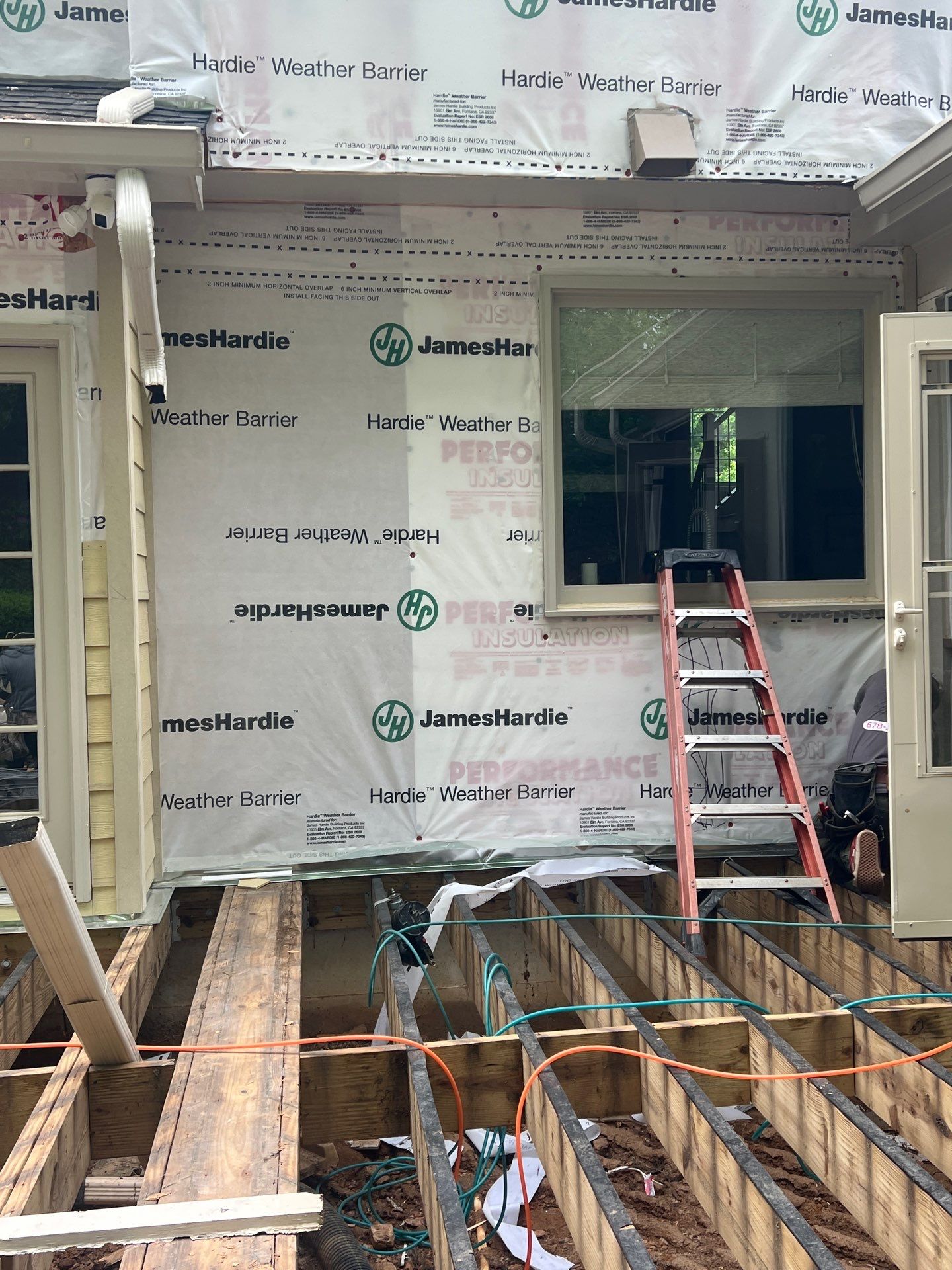 James Hardie Siding Install, Rotten Wood Replacement, Trex Deck Resurface, and Exterior Paint Project in Roswell, GA by Nelson Exteriors 