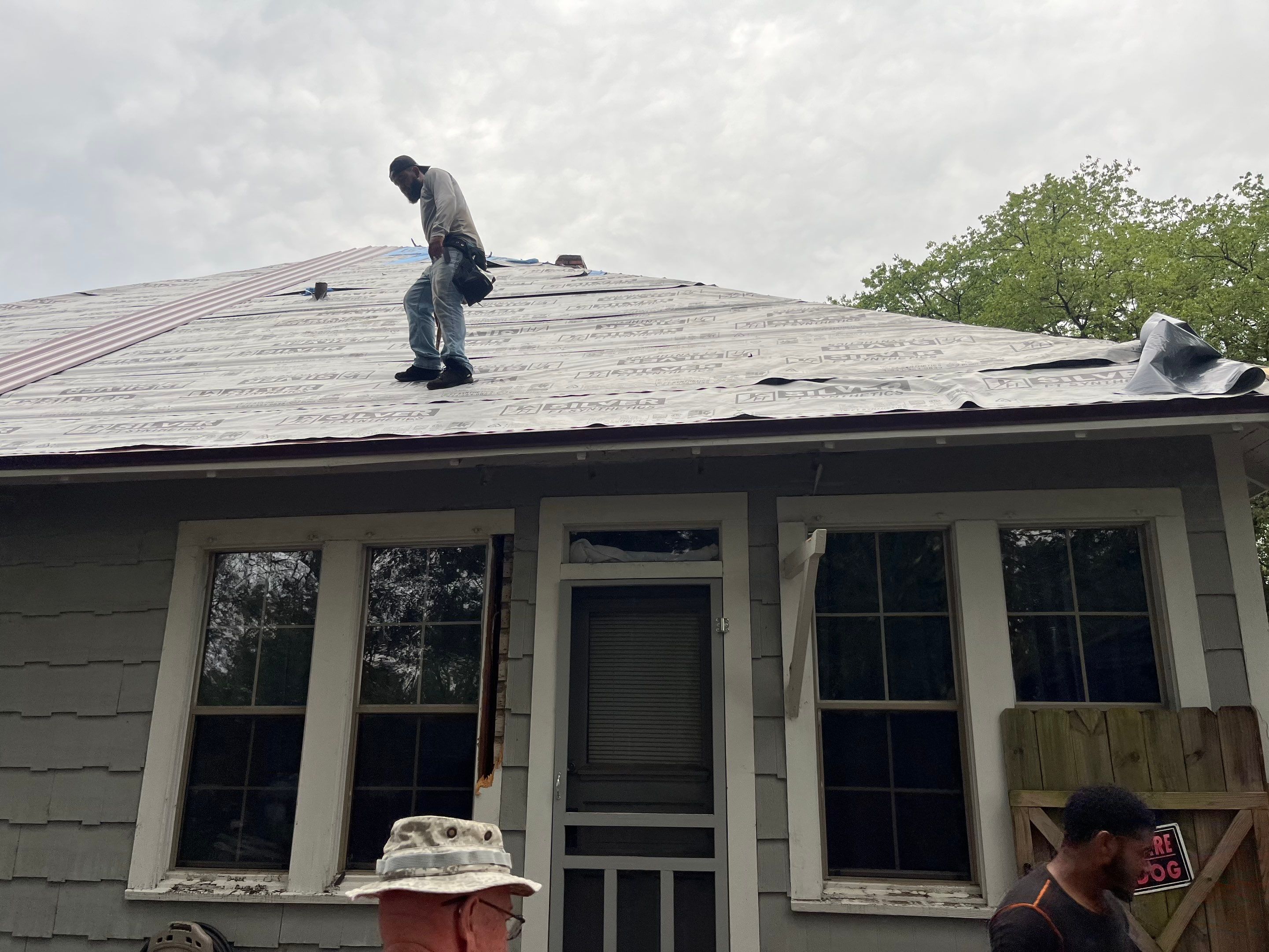 Residential Metal Roof Replacement using Reed's Metals: Colored Residental Panel (Burgundy) by Hostetler Roofing