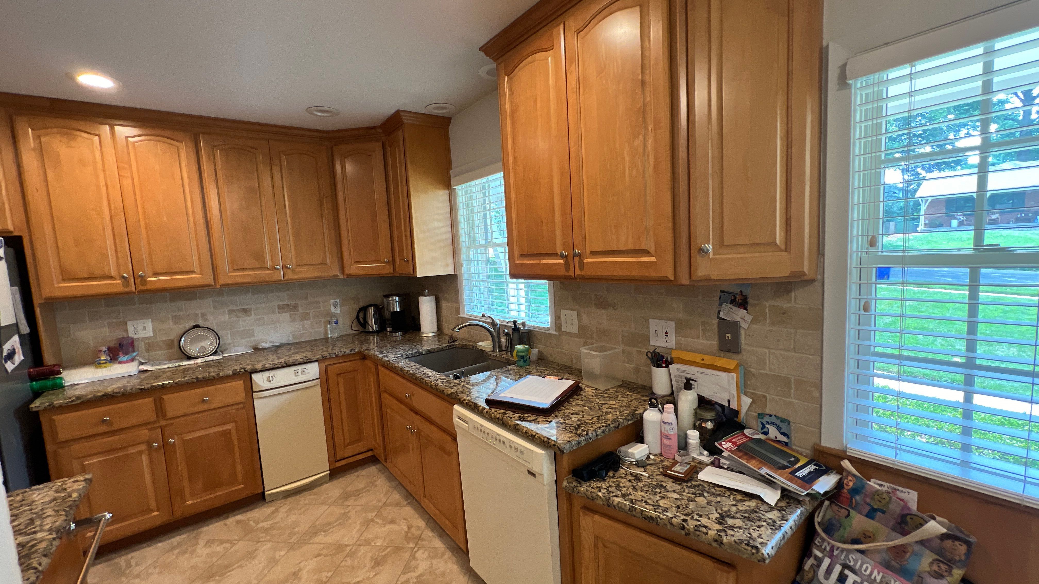 Elegant Transformation: Stained Cabinets Revamped with Sherwin-Williams Juniper by Cougar Painting