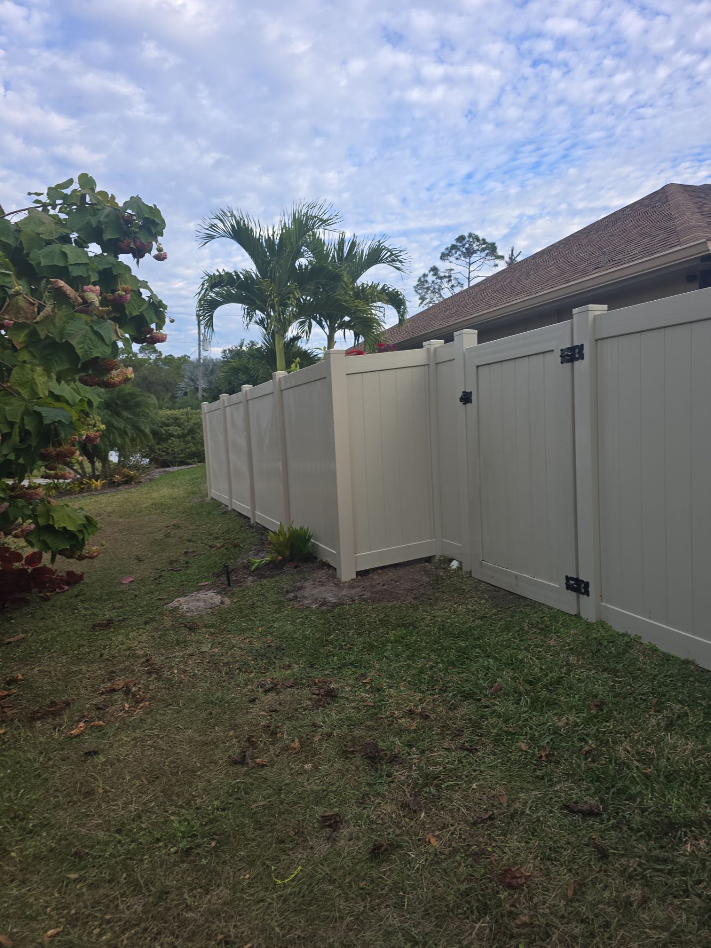 Tan Vinyl Fence in North Port by True Fence LLC