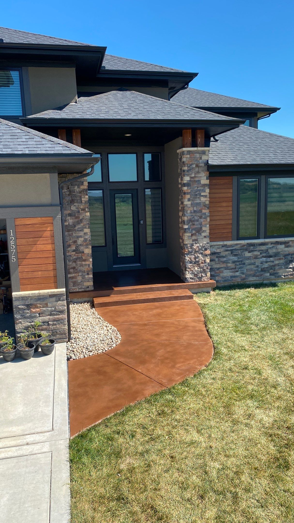 Olathe, KS -- Stoop/Sidewalk Tuscan Overlay by Big Red Decorative Concrete, LLC