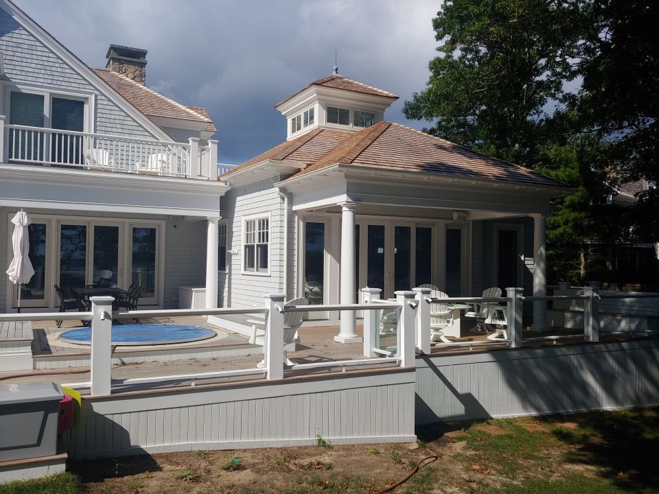 Gutter Installation using 6" Half Round Aluminum Gutter over Crown Moulding by Gutter Pro Enterprises