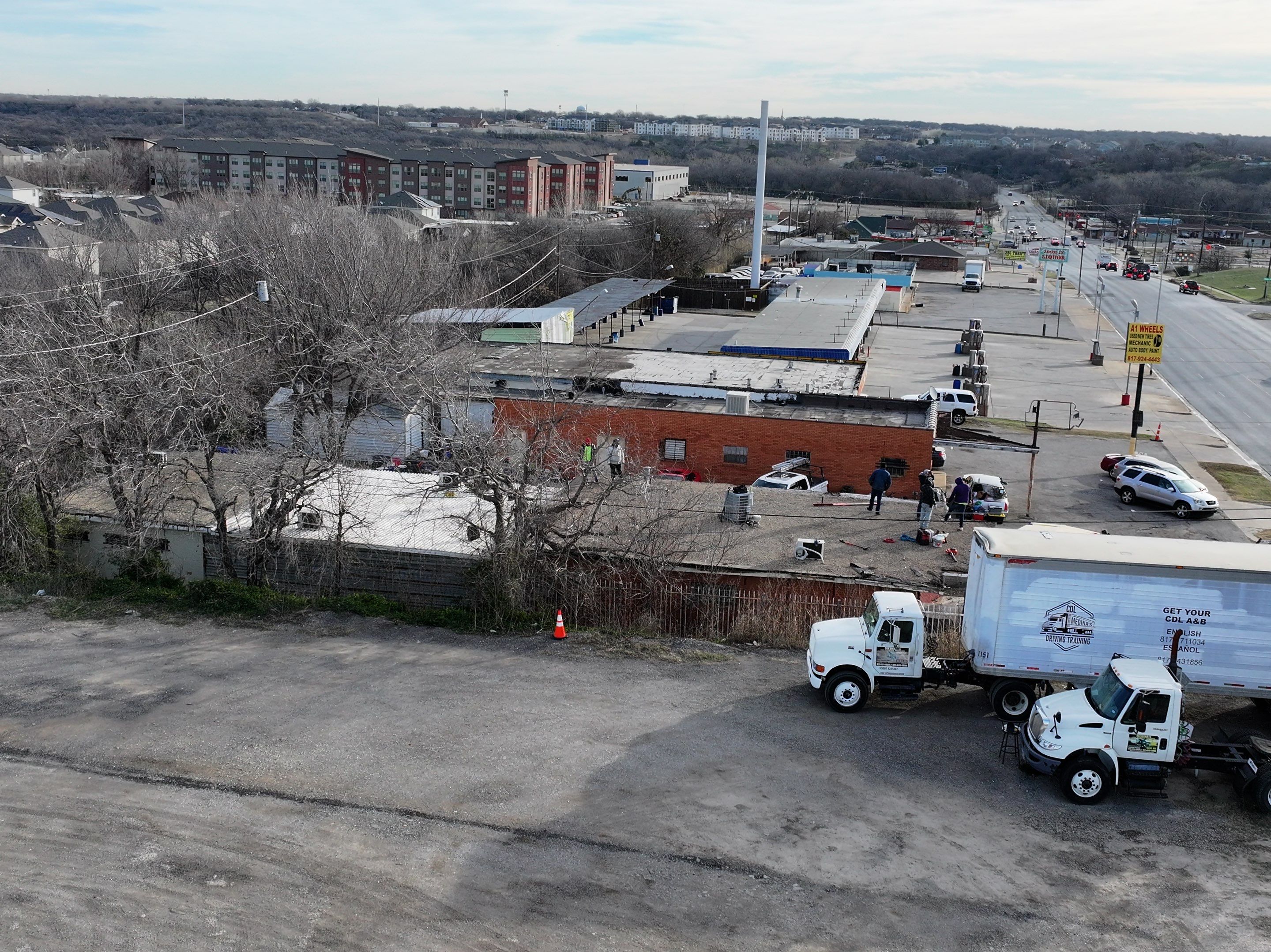 Commercial roofing overlay using GAF TPO over an old ballast roof by Becker Roofing and Exteriors