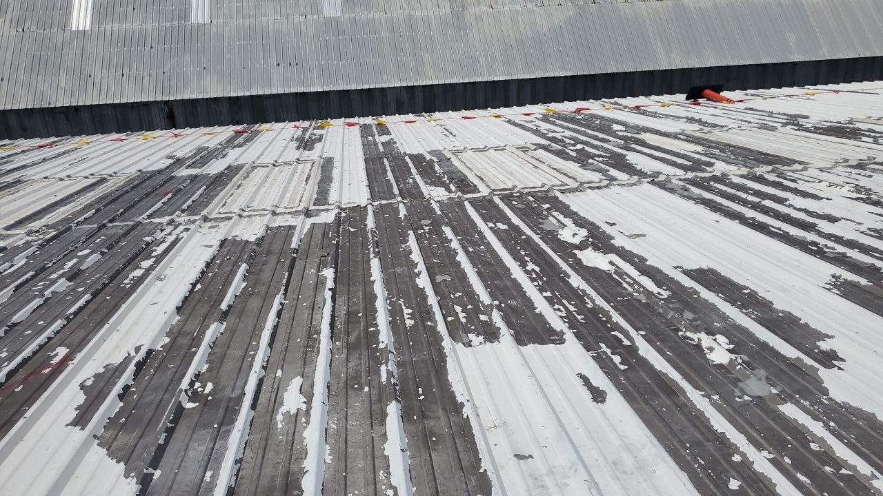 Commercial Roofing Installation using GAF 10 Year Acrylic System by Lighthouse Roofing