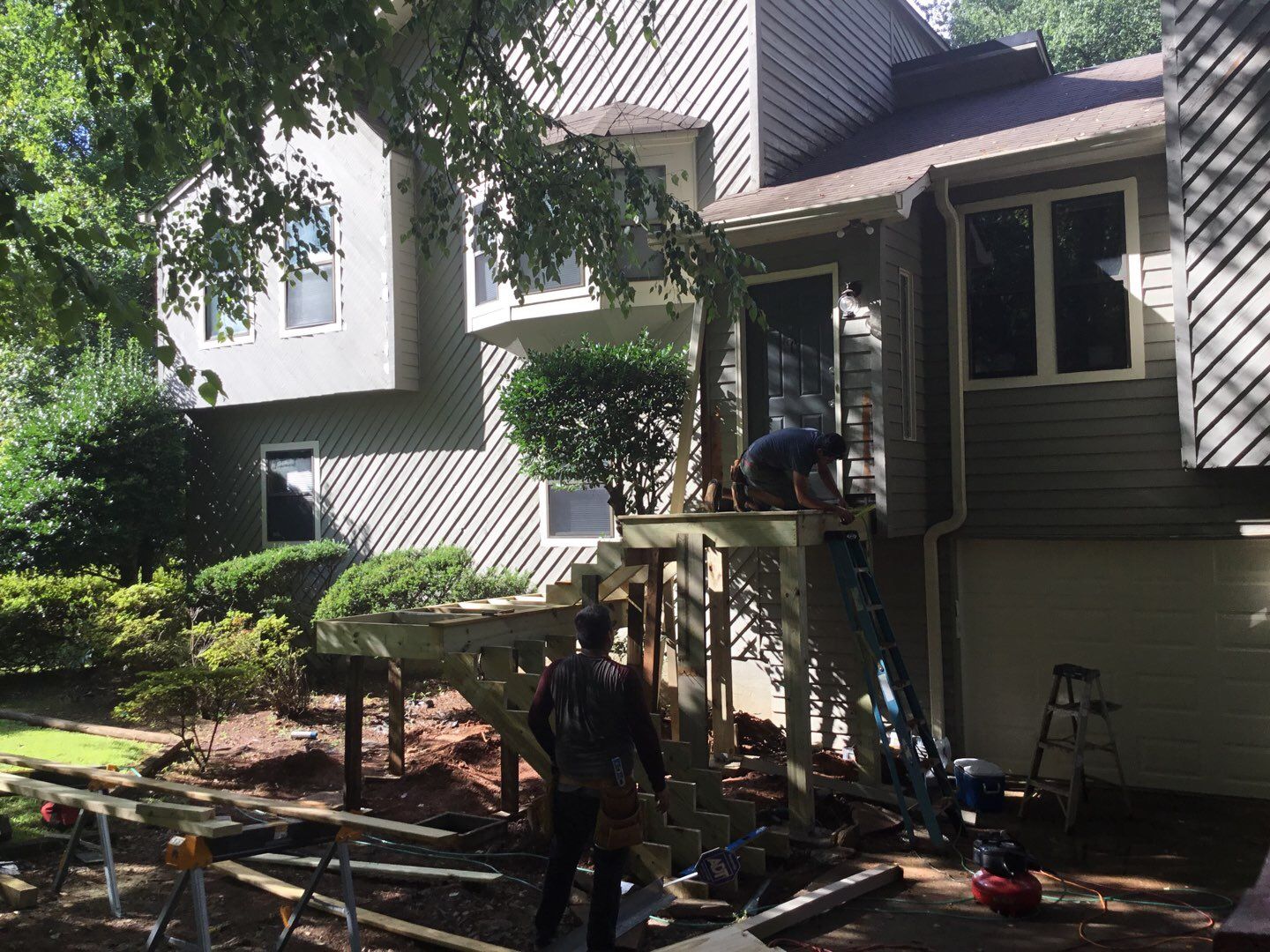 Elevated Wooden Deck and Front Porch Renovation in Marietta by Swift Home Renovations 