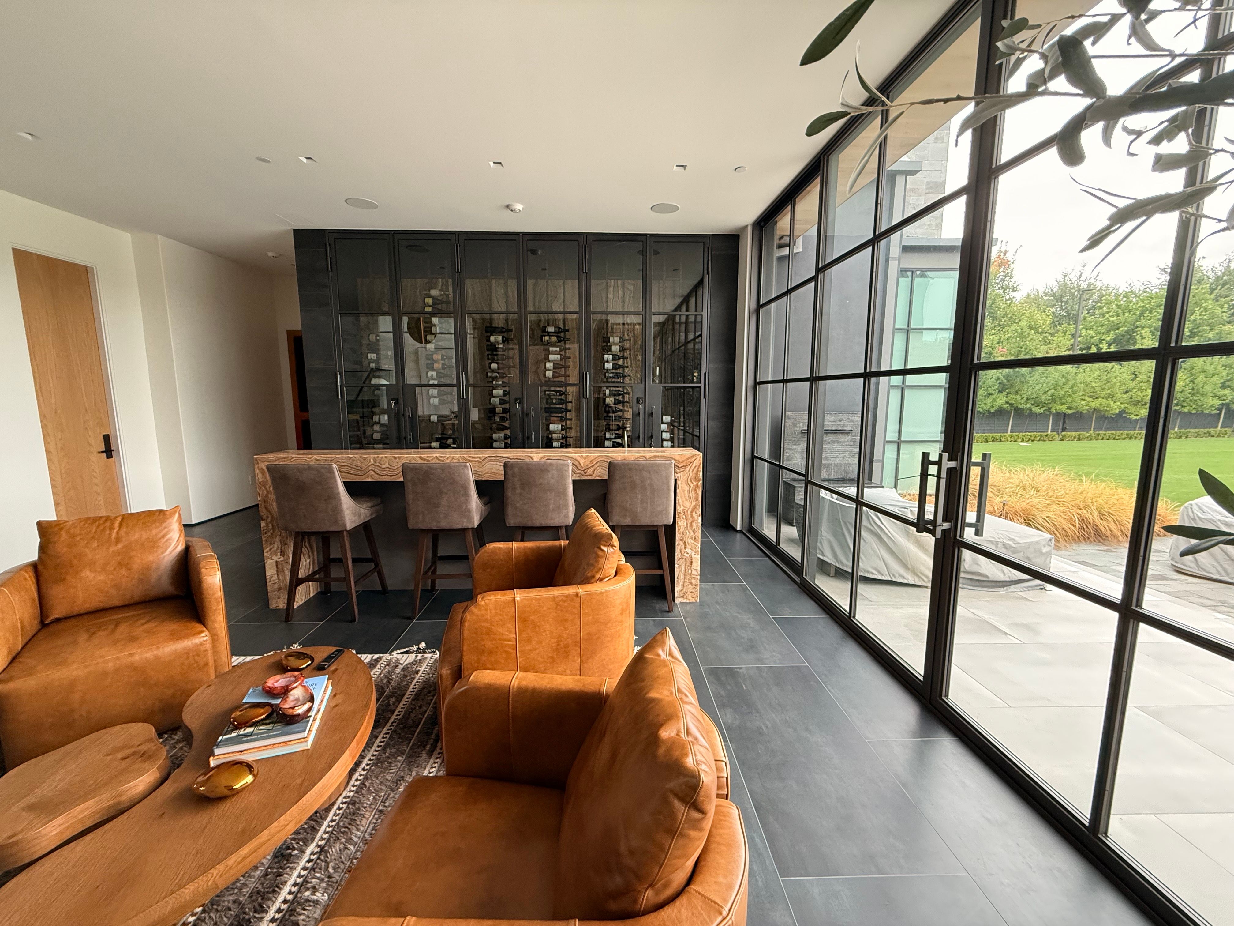Custom Black-Framed Glass Wine Cellar Installation in Dallas by Solara Custom Living