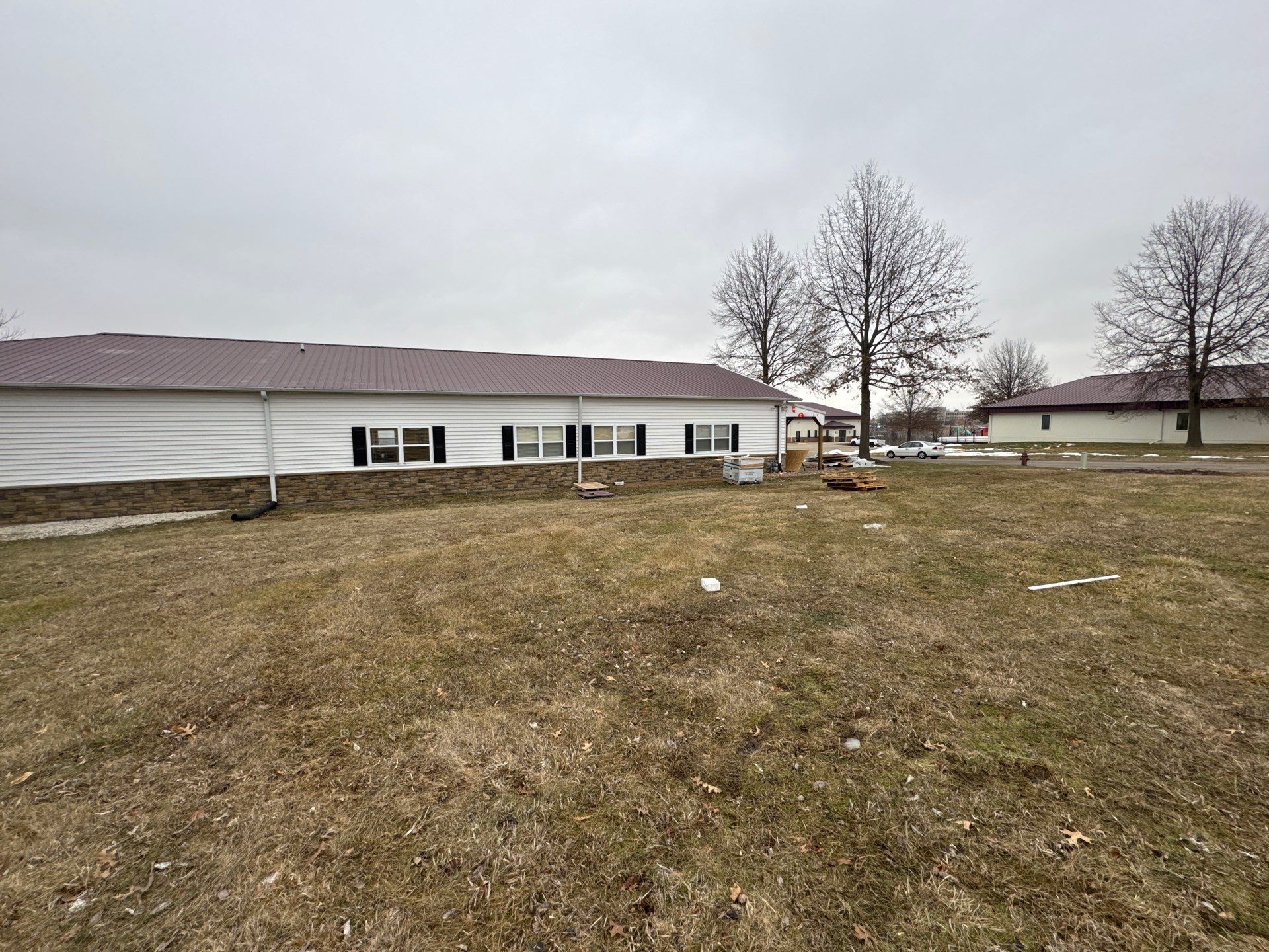 Siding and Stone Installation using Extrerior Porfolio Vinyl Siding and Versetta Stone by EEC  Windows, Siding & Roofing 