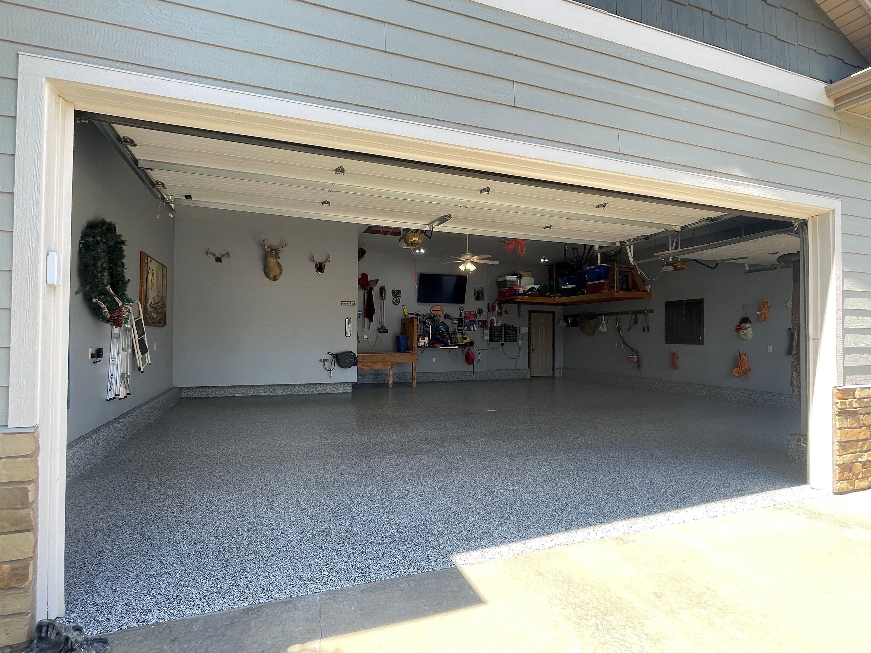 Residential Garage Floor Coating in Sioux Falls by Select Painting, Coatings & Garage Cabinets