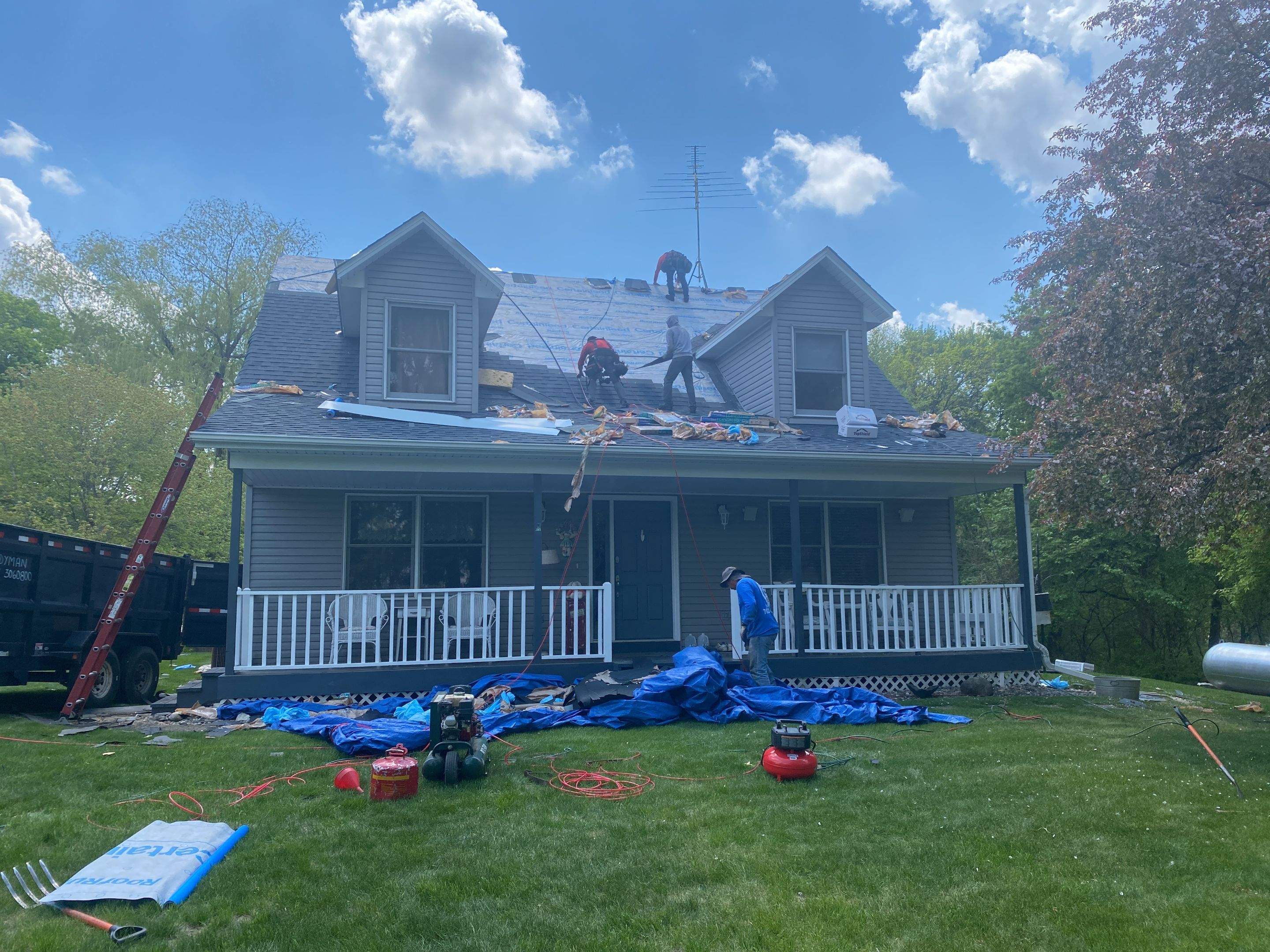 Residential Roofing Installation using Certainteed Landmark Moire Black by MODERN EXTERIOR SYSTEMS
