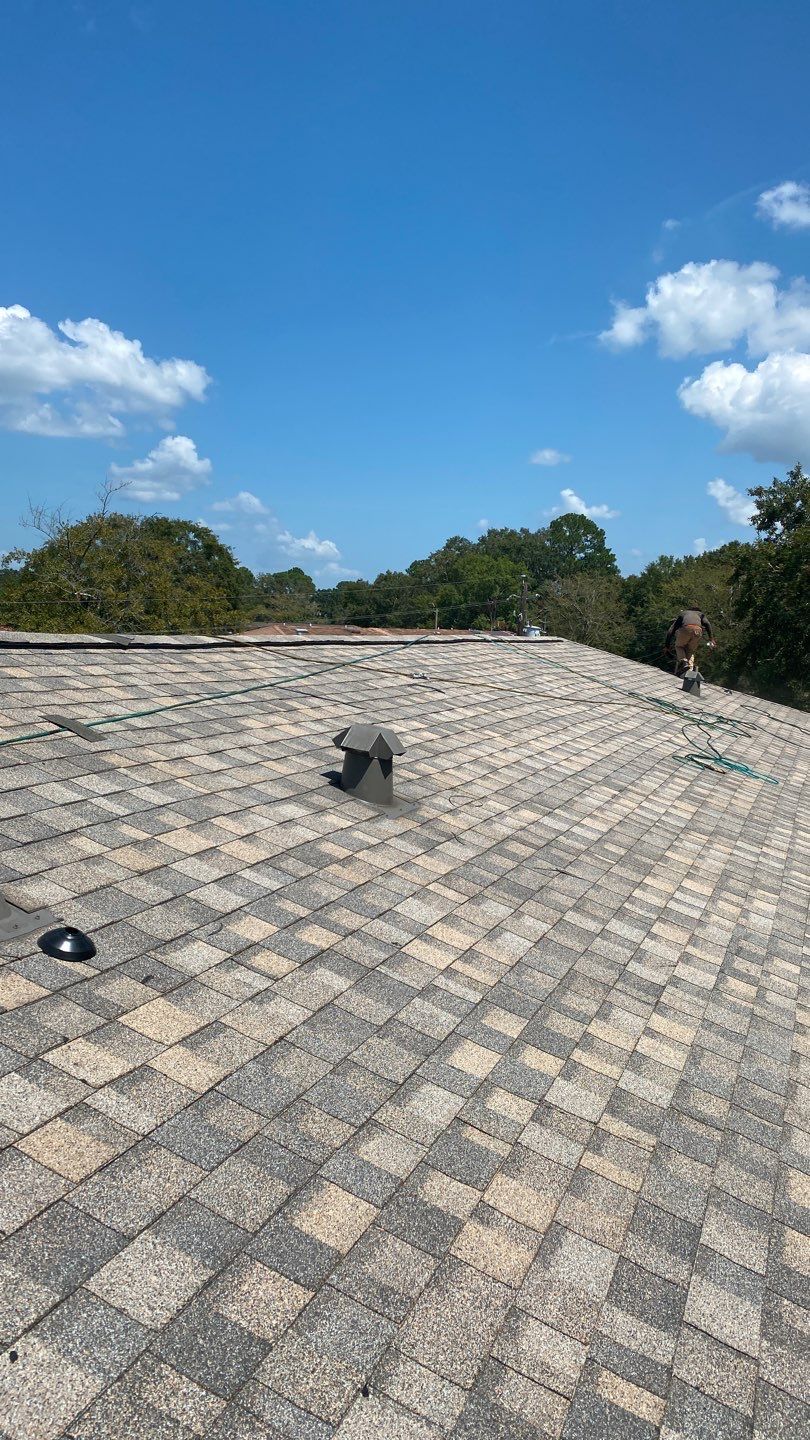 Residential Roofing Installation using Roof Replacement by American Roofing & Construction LLC