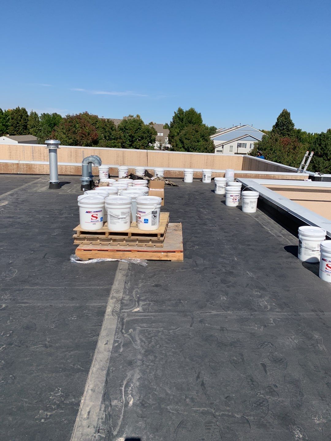 Commercial Roofing Installation using American Standard Coating - S  by A to Z Roofing