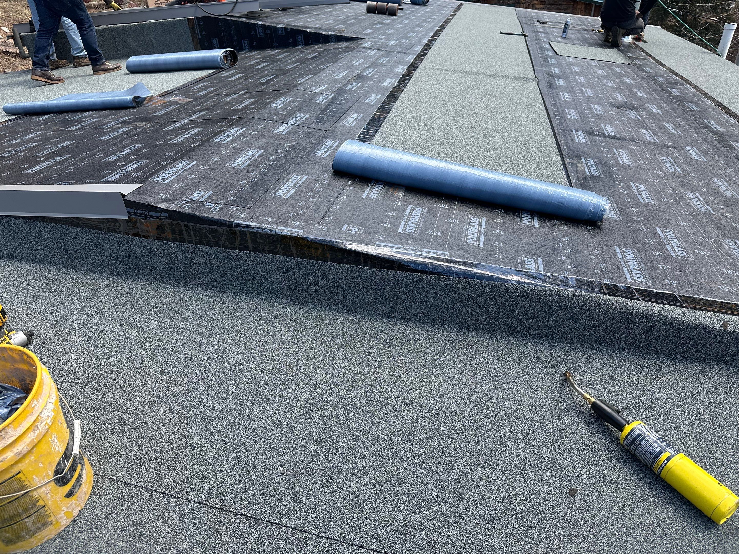 Residential Roofing Installation using Modified Bitumen Roofing by Blue Peaks Roofing LLC 