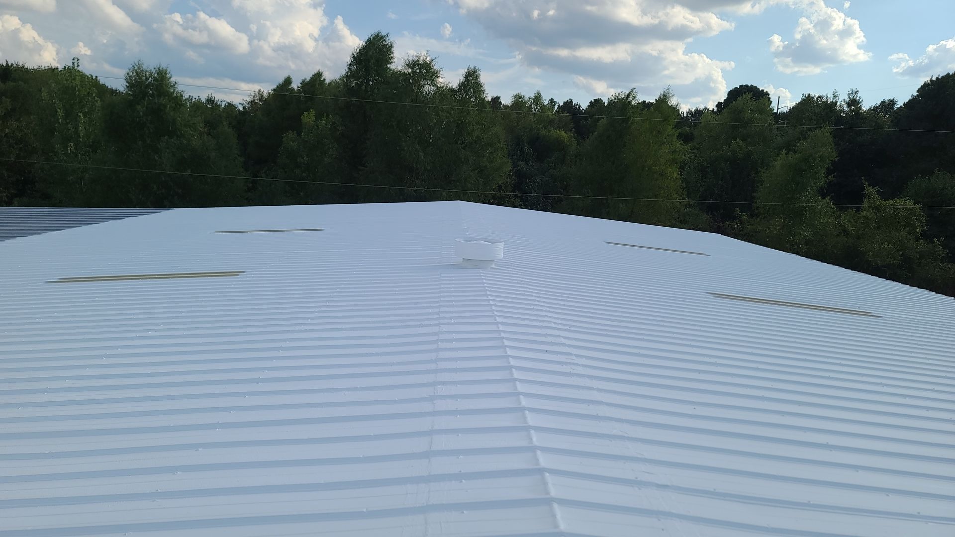 Commercial Metal Restoration System using Aldocoat Coatings by Hostetler Roofing