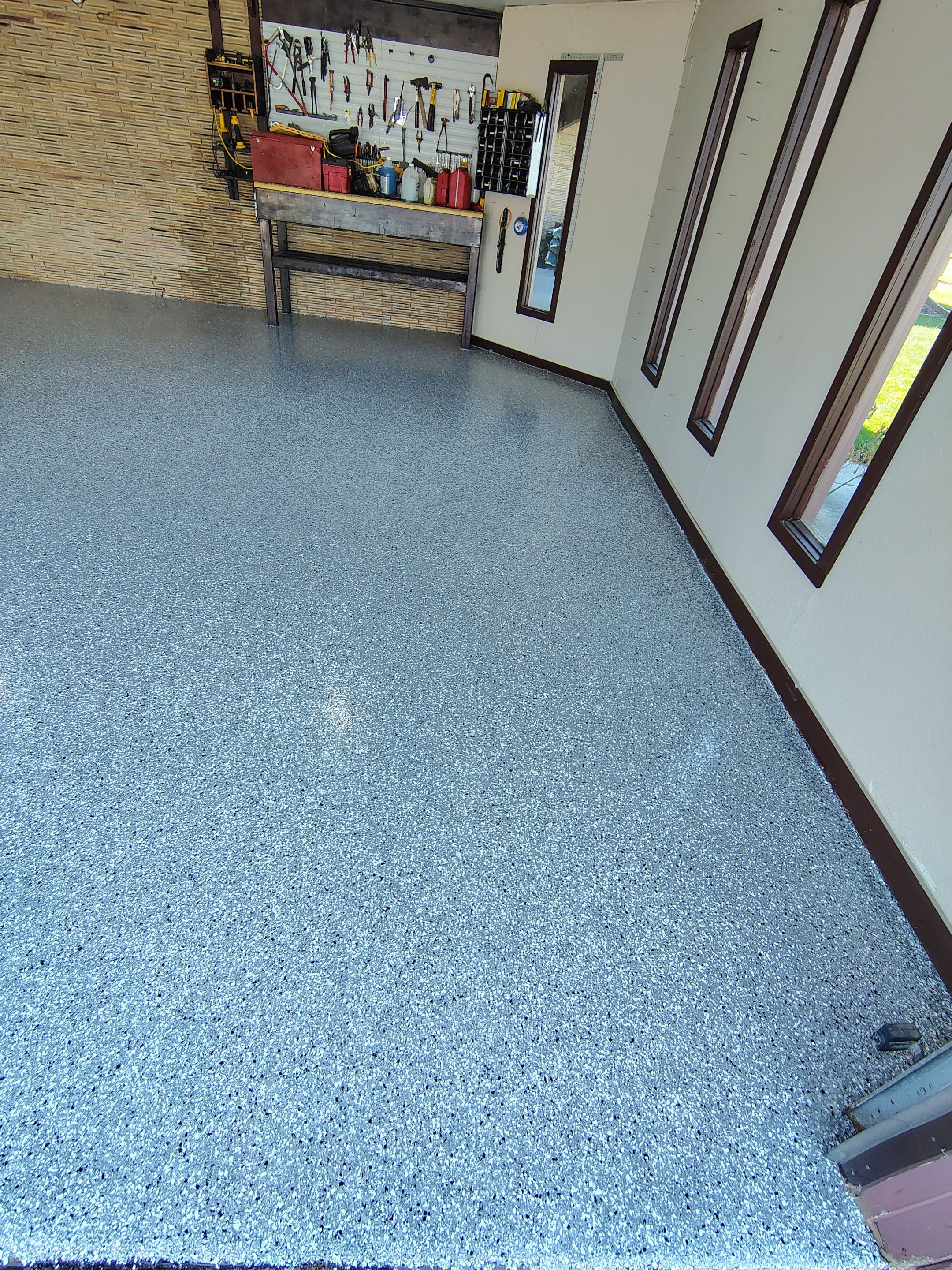 Garage Floor Coating with Crack Repair in Yankton by Select Painting, Coatings & Garage Cabinets