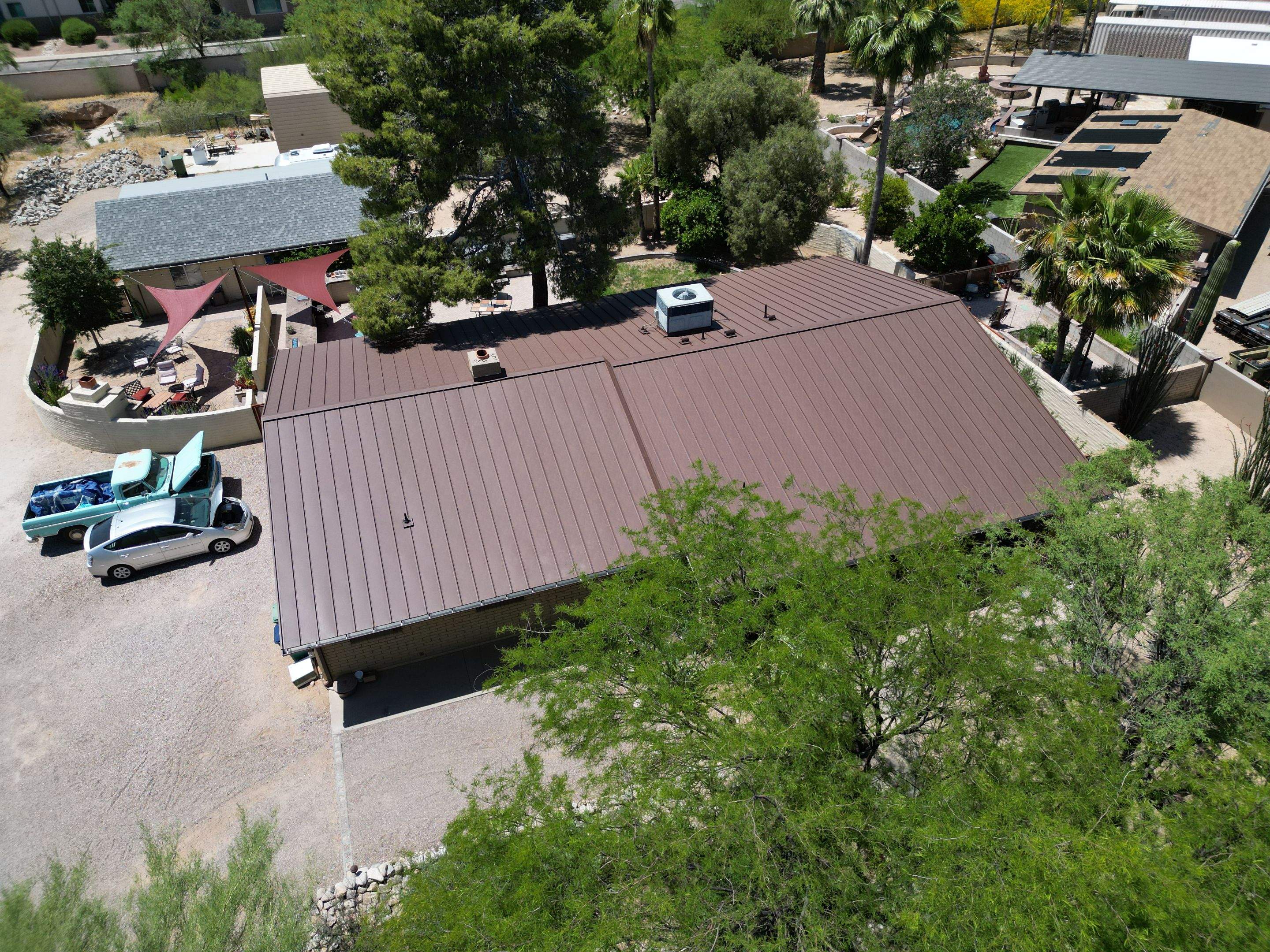 Weathered Rust Standing Seam by Reimagine Roofing