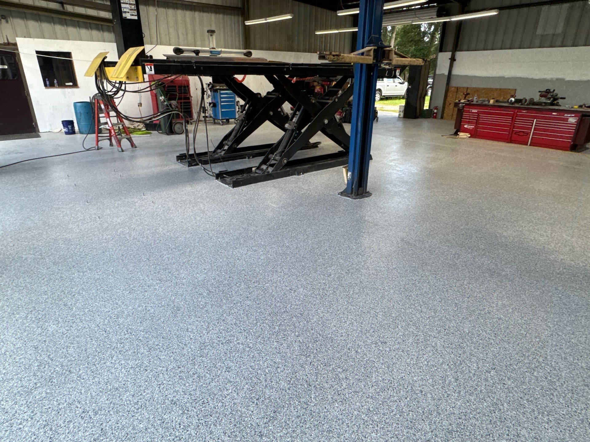 Auto Shop Project in Mayo, FL in Tidal wave by Cross Creek Concrete Coatings