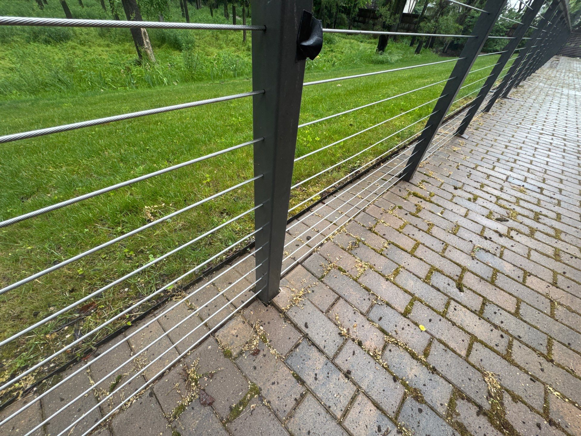 Brick paver repair, cleaning, sealing and poly sanding by Northern Power Washing LLC.