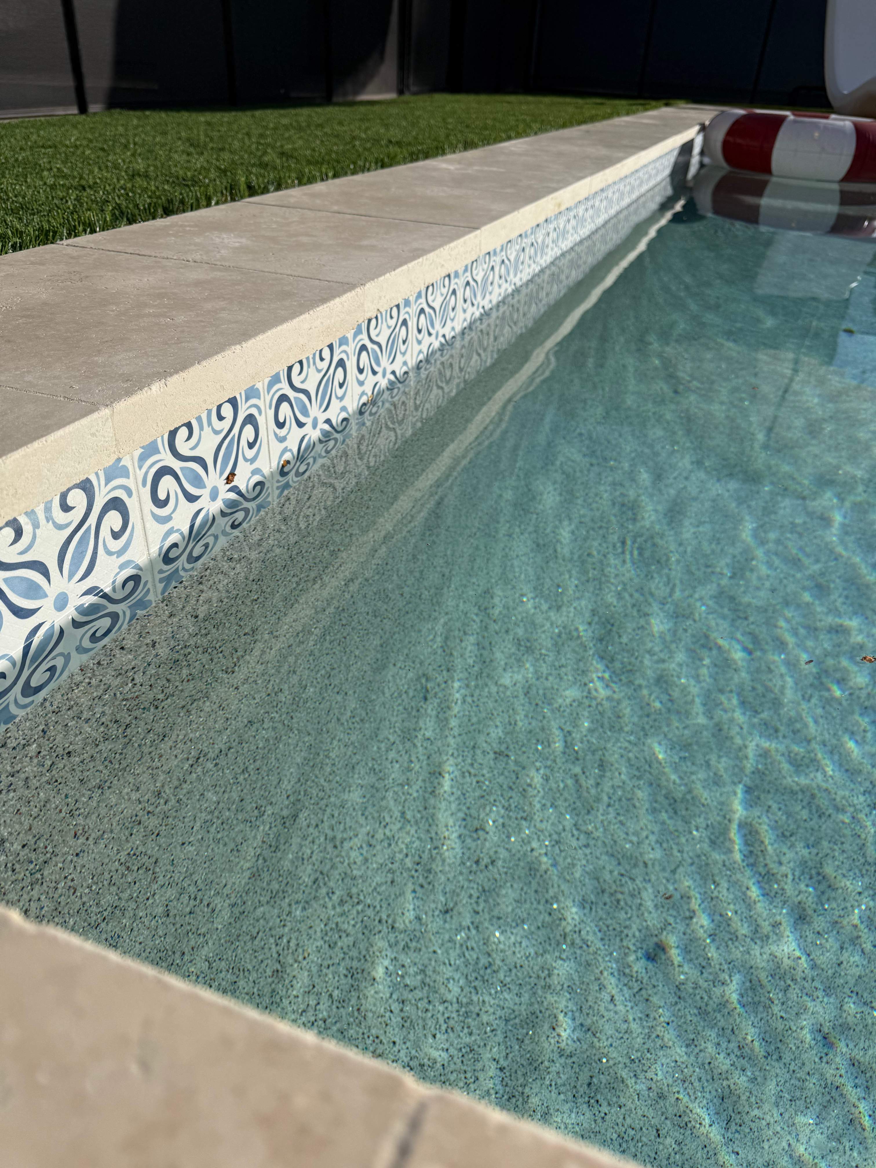 Pool build with baja step and pebble finish by Modern Pools