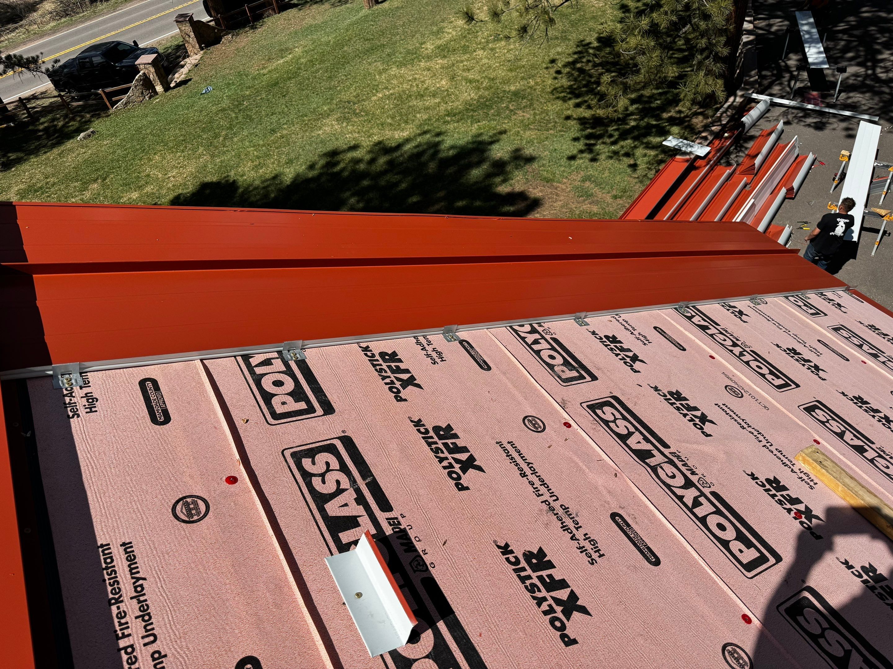 Residential Roofing Installation using Standing Seam Metal by Blue Peaks Roofing LLC 