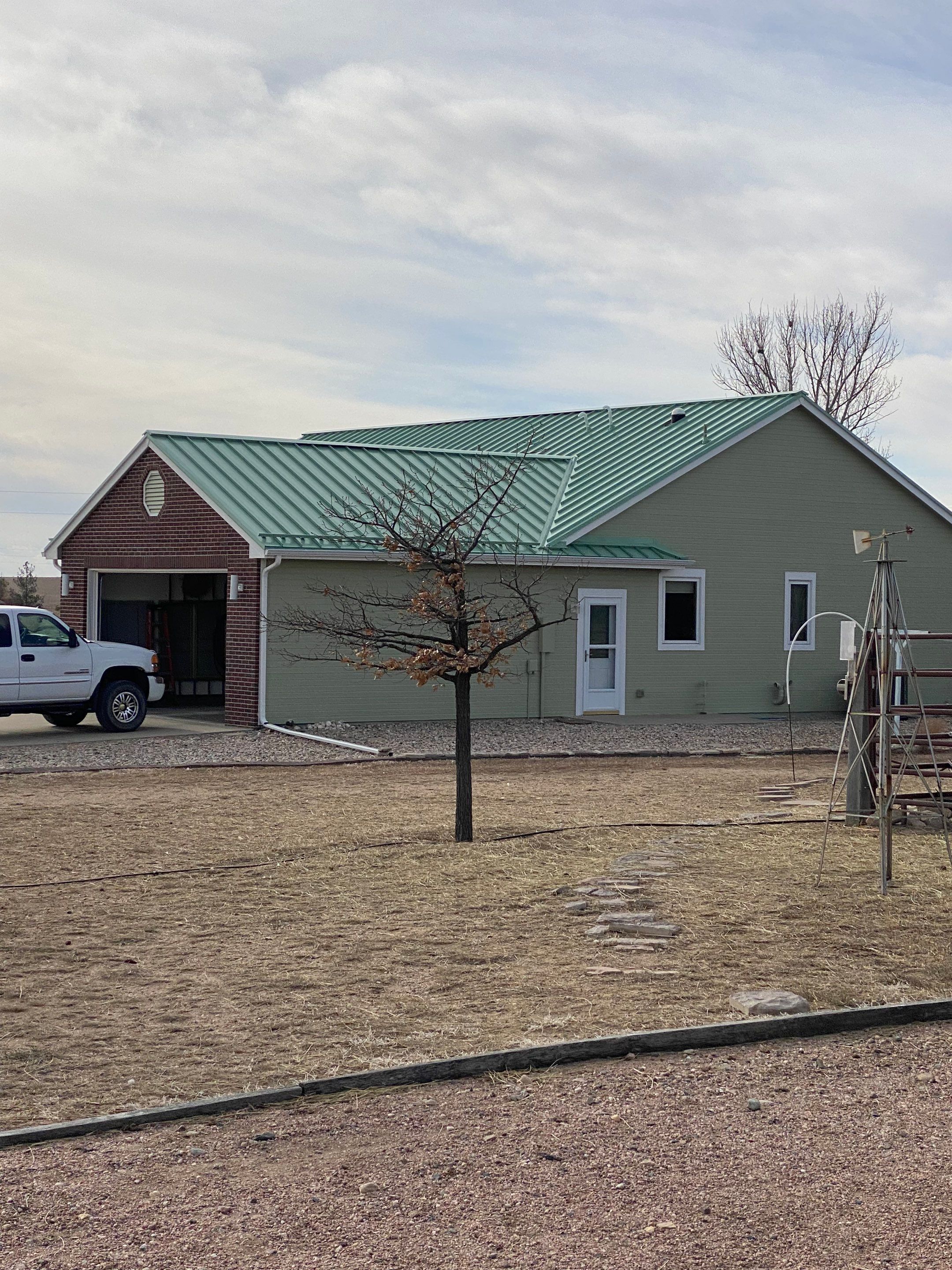 Staning Seam Metal using 1.75" Snap Lock Standing Seam Class 4 Impact Resistant  by Black Belt Roofing 