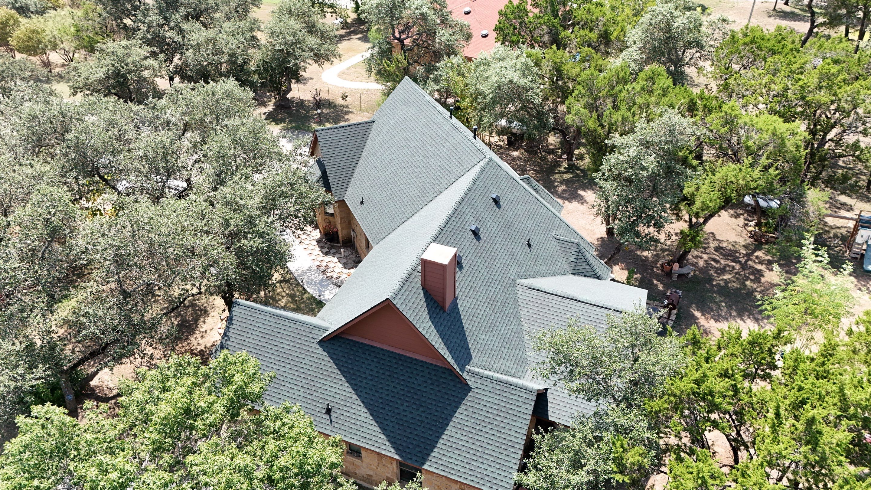 Residential Roof Replacement using GAF - HDZ - Hunter Green by Action Exteriors Austin
