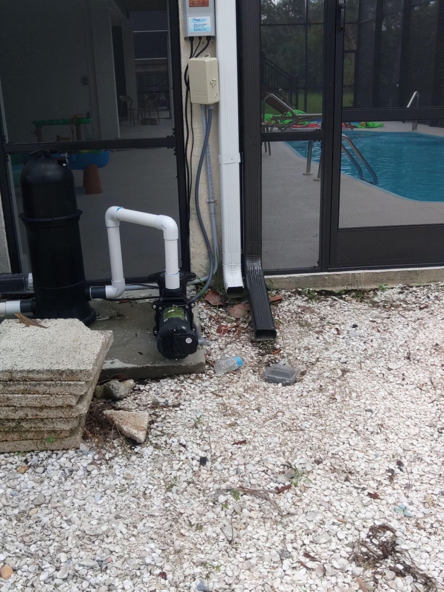 Complete Gutter System with Downspouts & Guards in Fort Myers Beach FL by Gutter Professors