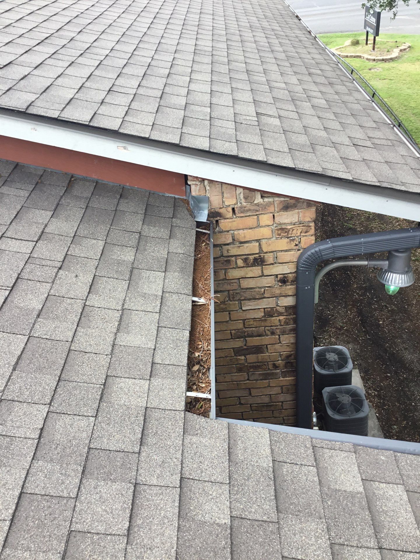 Commercial gutter cleaning Killeen & Temple, TX, TX before photo with filled gutters