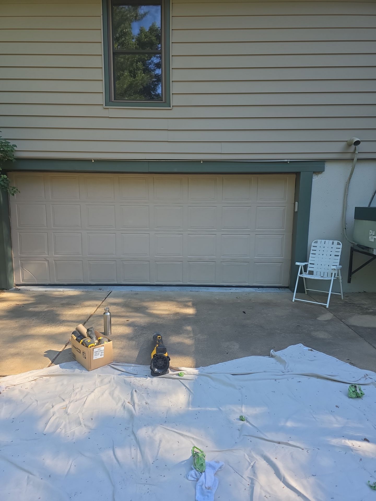 Exterior Entry Door and Garage Door Painting by Legendary Services Company LLC.